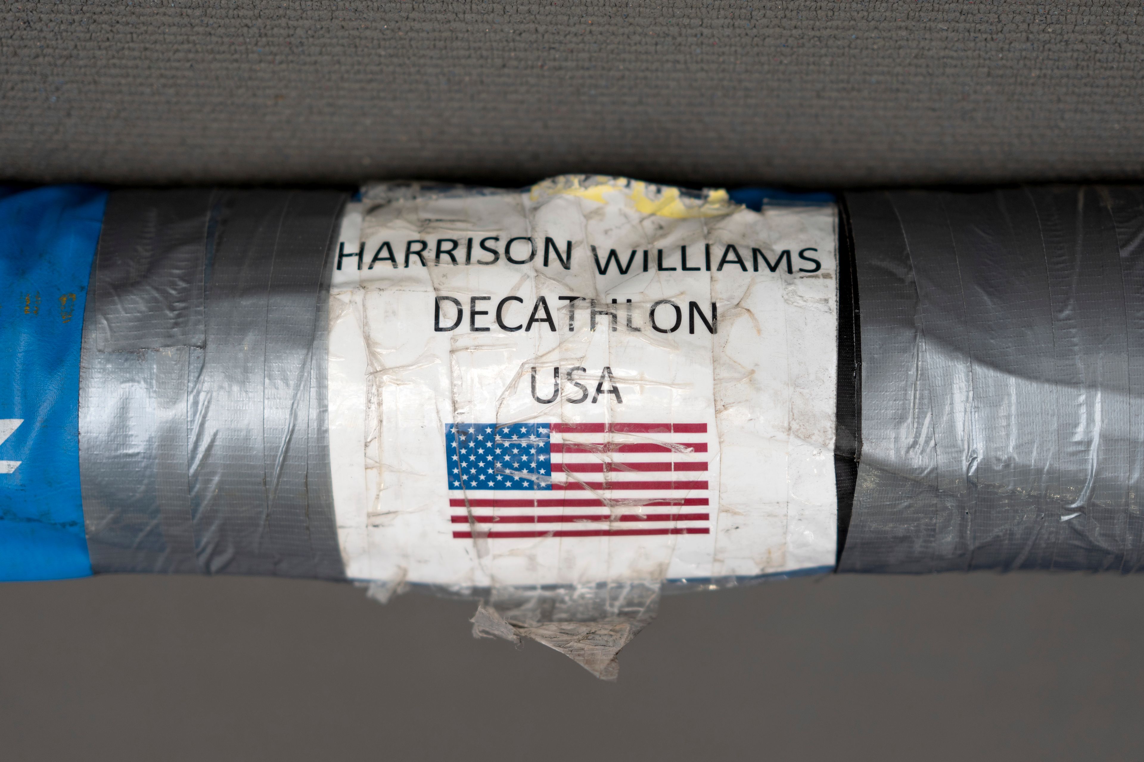 The pole vault luggage bag of decathlon athlete Harrison Williams sits on the track at the Team USA training facility at the 2024 Summer Olympics, Tuesday, July 30, 2024, in Eaubonne, France. (AP Photo/David Goldman)