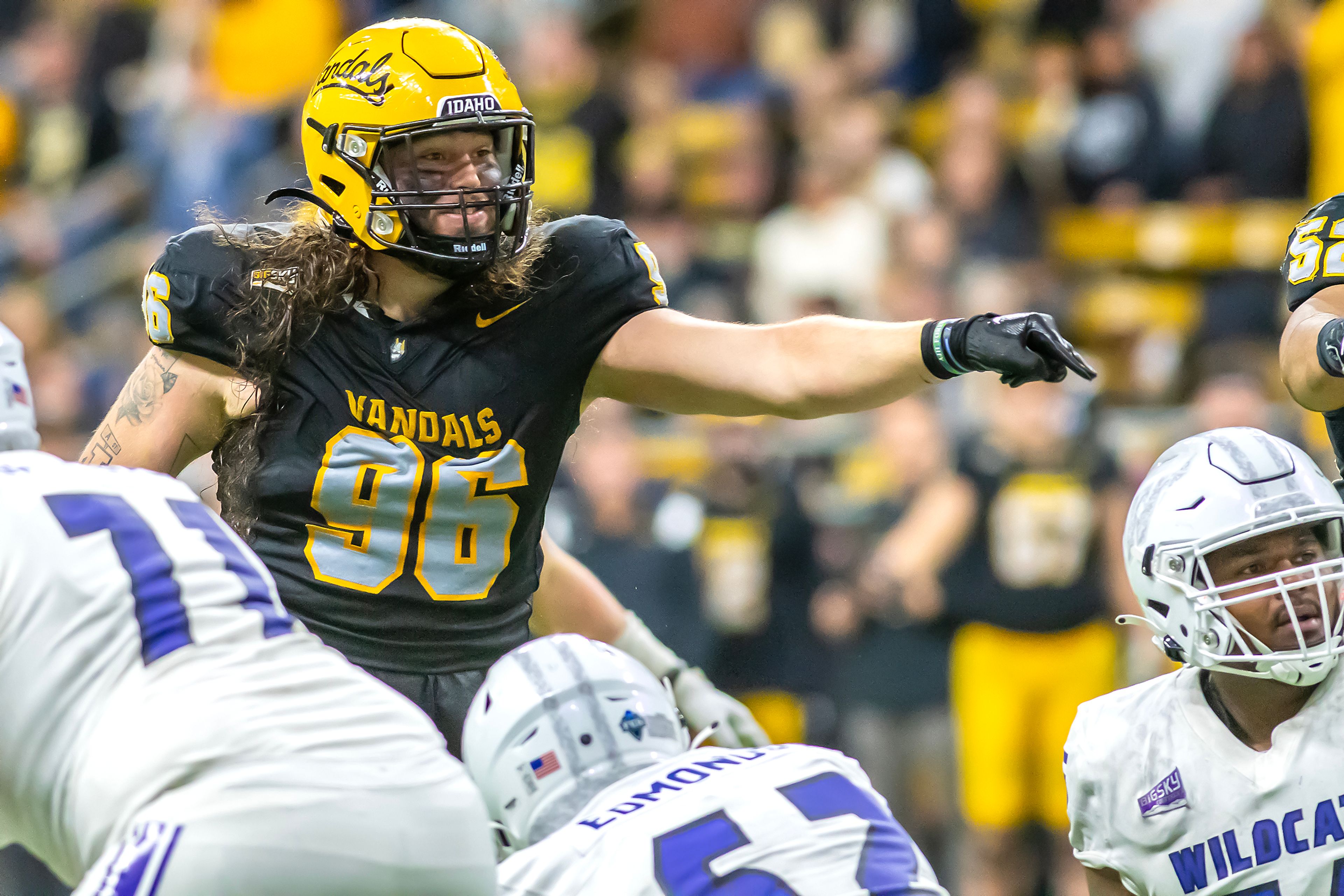 Idaho defensive lineman Zach Krotzer points out a Weber State false start during a quarter of a Big Sky conference game Saturday at the P1FCU Kibbie Dome in Moscow.