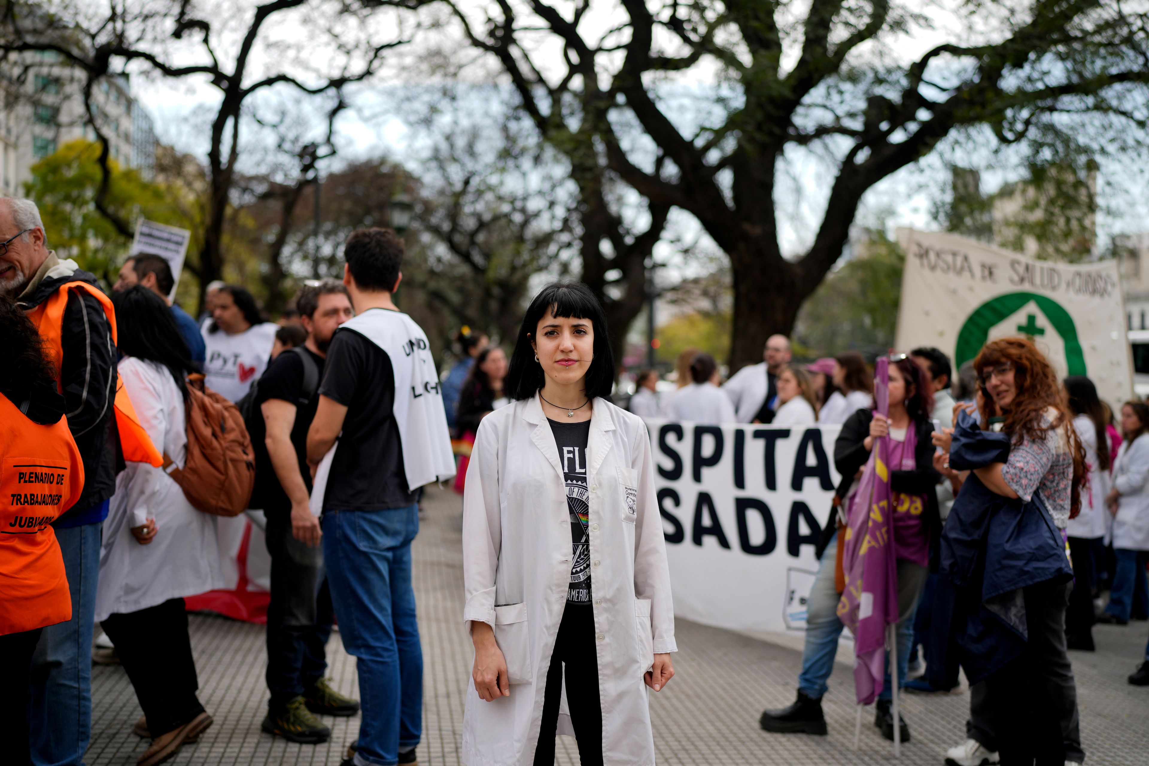 Lab tech Emilce Correa Louzao, who works at the state pediatric Hospital Garrahan, protests at the Heath Ministry demanding a salary raise in Buenos Aires, Argentina, Thursday, Sept. 19, 2024. (AP Photo/Natacha Pisarenko)