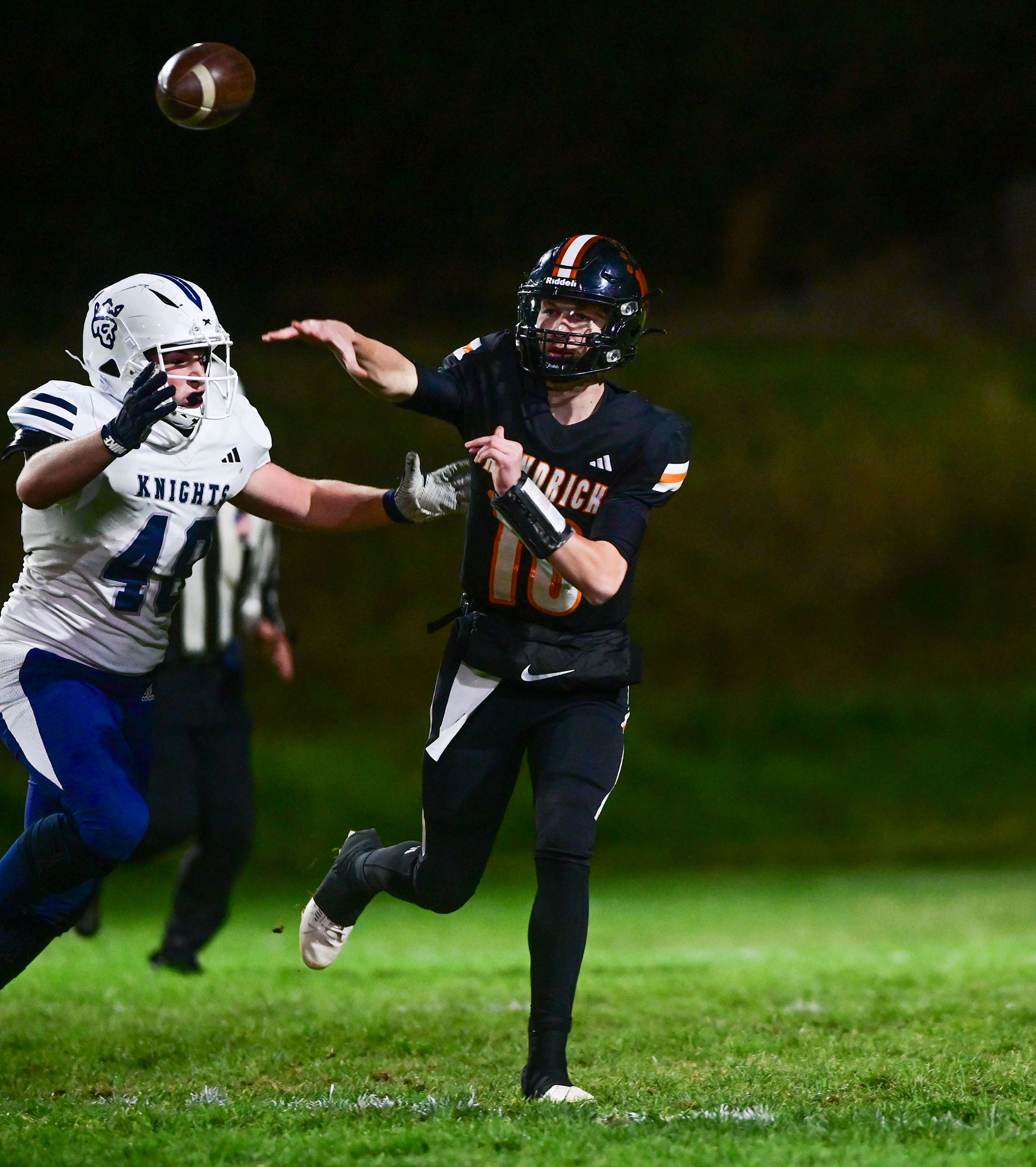 Logos defensive tackle Peter Story pressures Kendrick quarterback Maddox Kirkland Friday in Kendrick.,