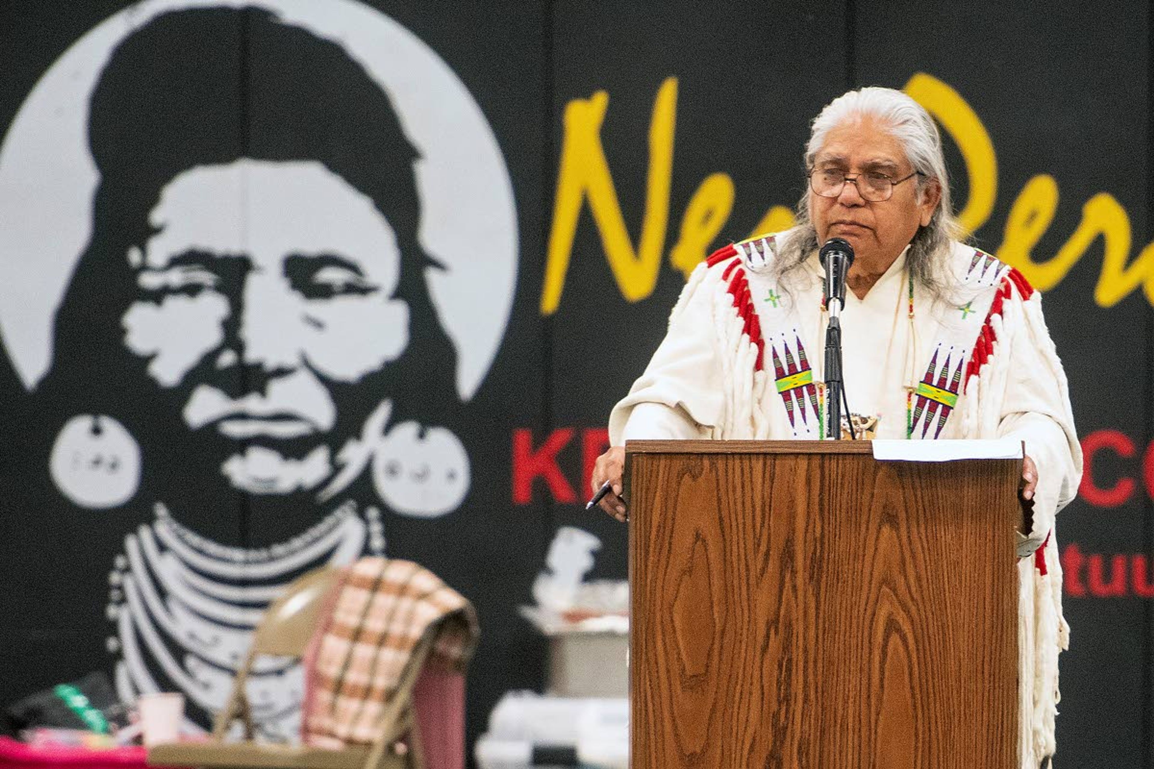 Allen Pinkham talks about his family’s history during a ceremony honoring his brother, Alex, 94, for his service in World War II on Saturday at the Pi-Nee-Waus Community Center in Lapwai.