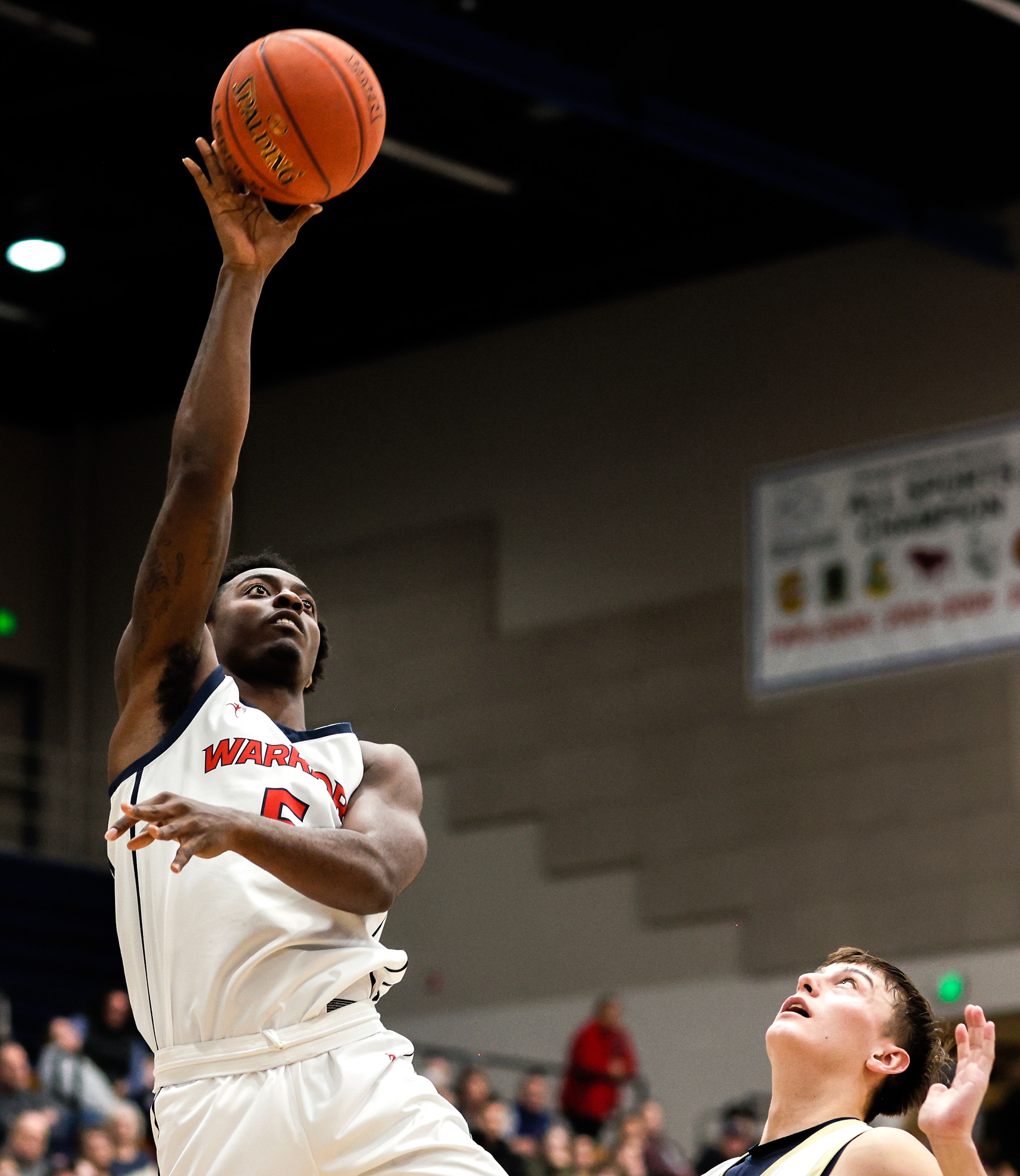 Lewis-Clark State guard Oreon Courtney shoots the ball against Eastern Oregon during a Cascade Conference game Friday at Lewis-Clark State College.