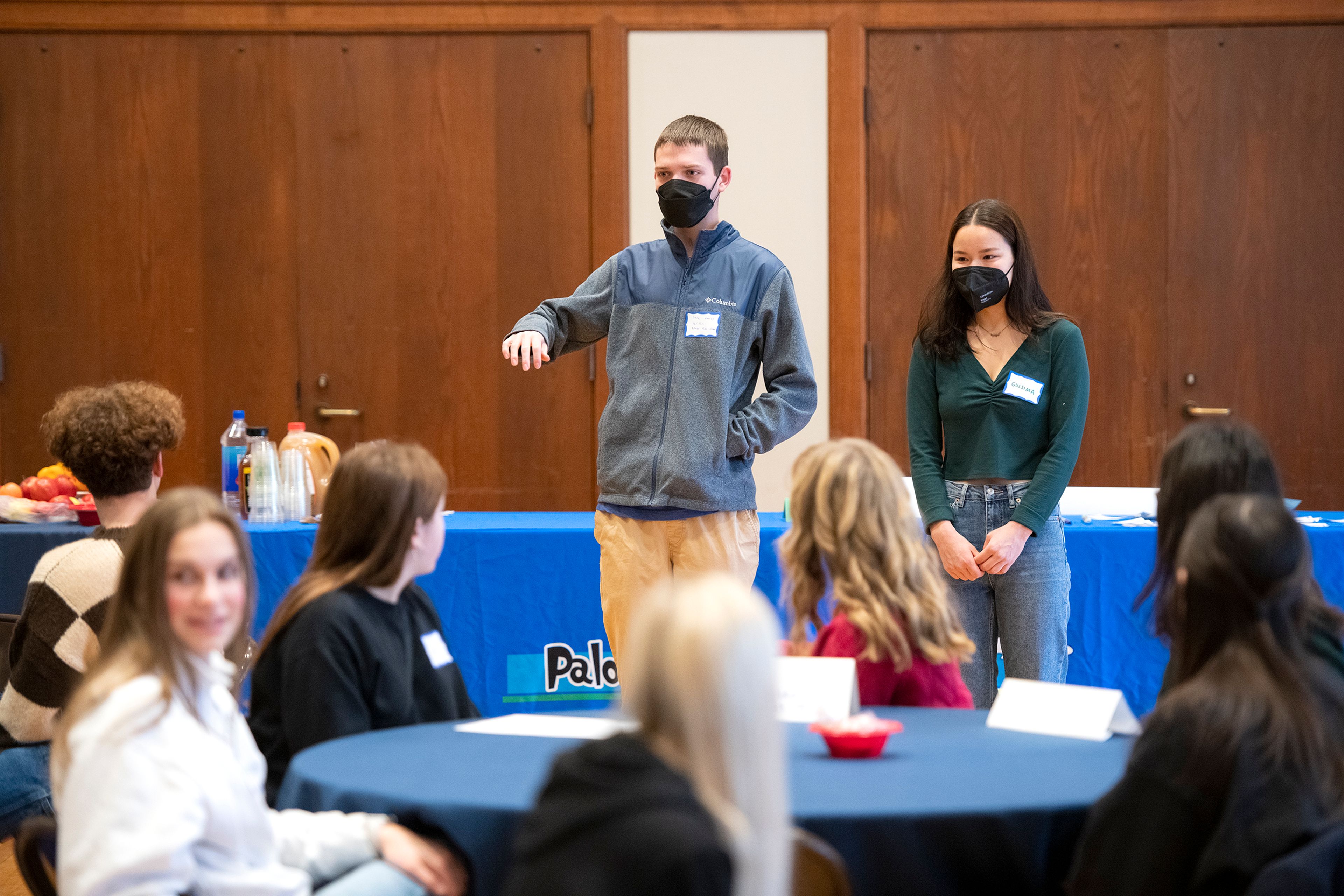 Lucas Mooney, left, and Gulsima Young introduce themselves during a Palouse Pathways event at the 1912 Center in Moscow on Wednesday. Mooney attends Pullman High school, while Young currently studies computer science at the University of Washington.