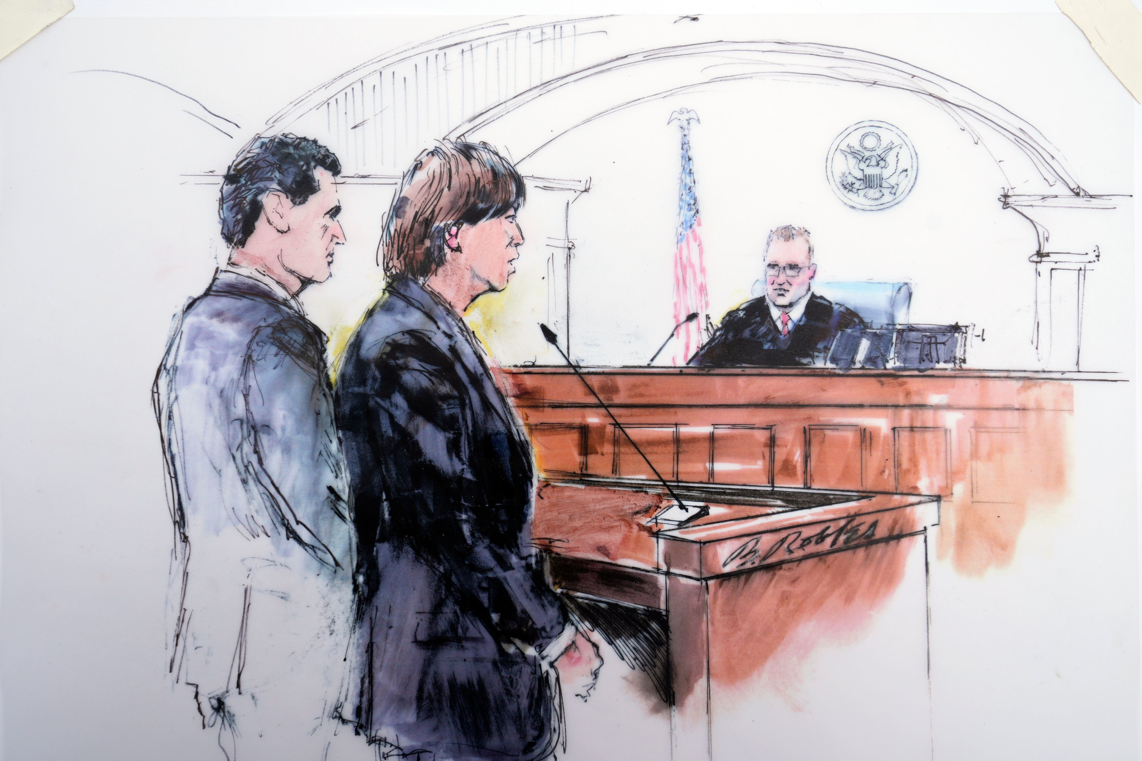 In this courtroom sketch, defense attorney Michael G. Freedman, left, and his client Ippei Mizuhara, the former interpreter for the Los Angeles Dodgers star Shohei Ohtani, appear in front of U.S. District Judge John Holcomb in federal court in Los Angeles, Tuesday, June 4, 2024. Mizuhara pleaded guilty to bank and tax fraud on Tuesday and admitted to stealing nearly $17 million from the Japanese baseball player to pay off sports betting debts.