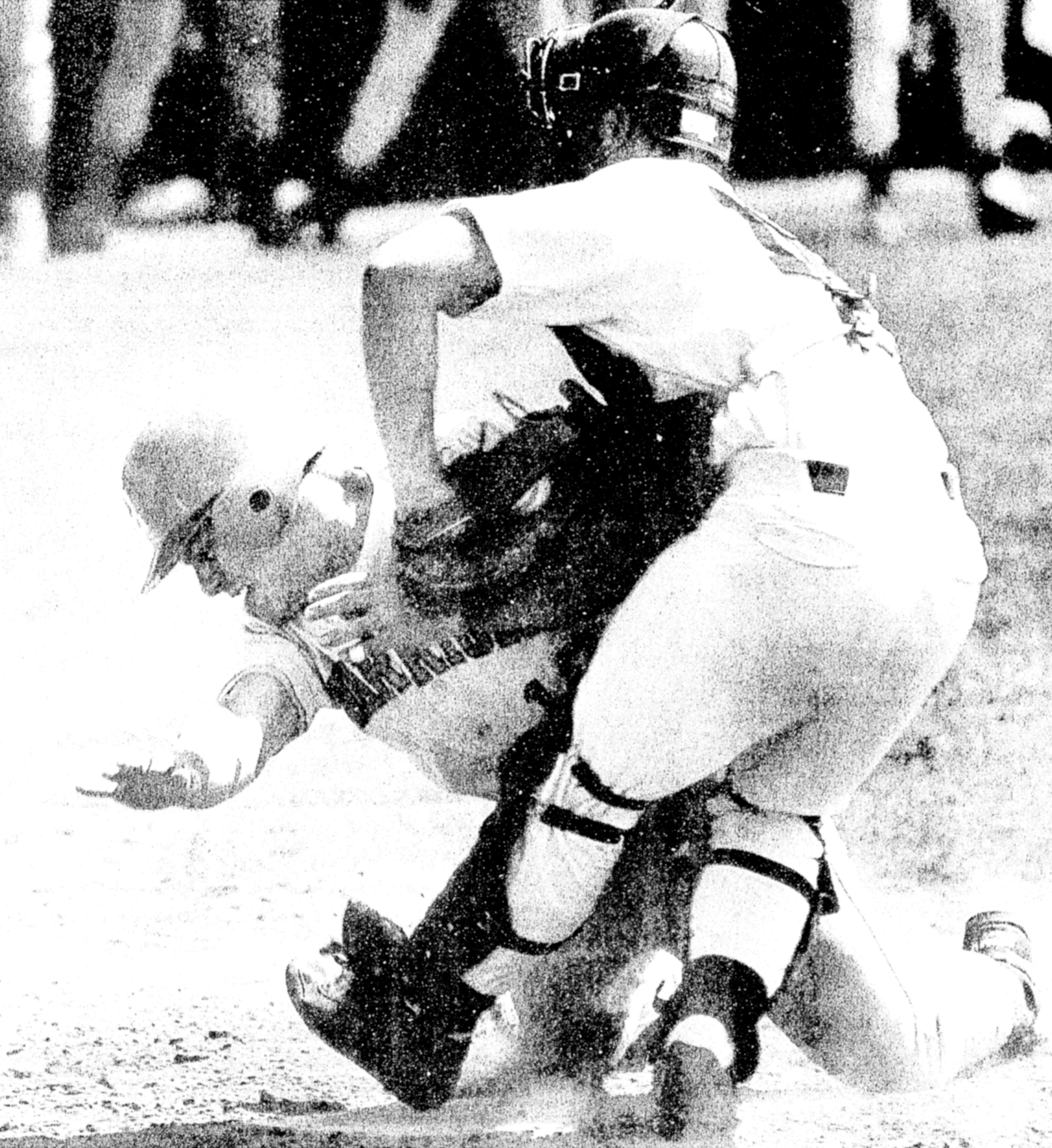 Lewis-Clark State’s Jake Taylor gets nailed at home by Azusa Pacific’s Michael Jordan while trying to score in the top of the second inning. The Warriors beat the Cougars 12-6 in Game 6 of the NAIA Area 1 tournament Saturday at Harris Field. (Tribune/Jim Vollbrecht)