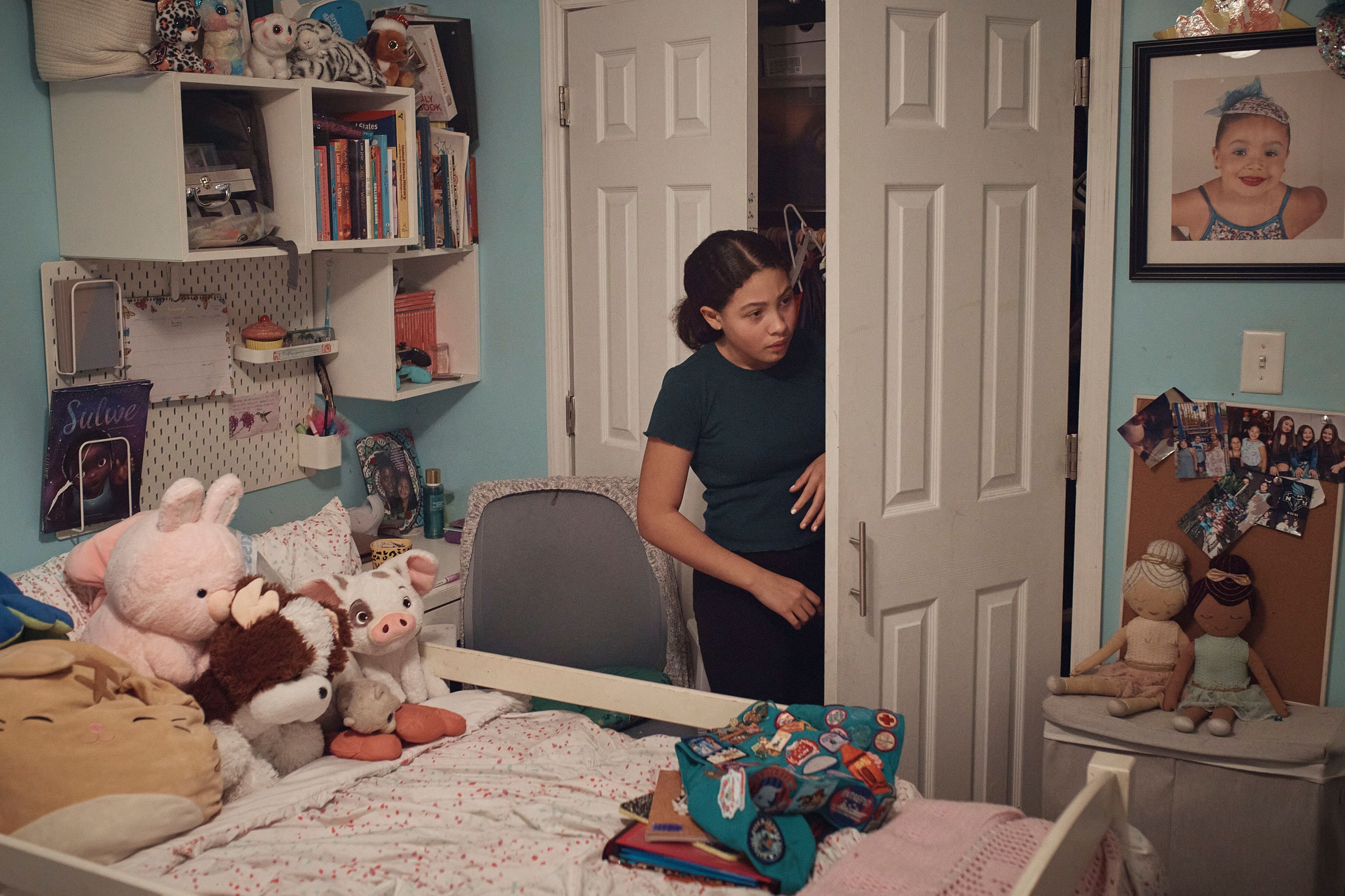 Grace Durham, 11, checks her wardrobe inside her room on Saturday, Jan. 27, 2024, in New York. No longer just a distraction or a way to connect with friends, social media has matured into a physical space and a community that almost all U.S. teenagers belong to. Up to 95% of teenagers say they use social media, with more than one-third saying they are on it “almost constantly,” according to the Pew Research Center.