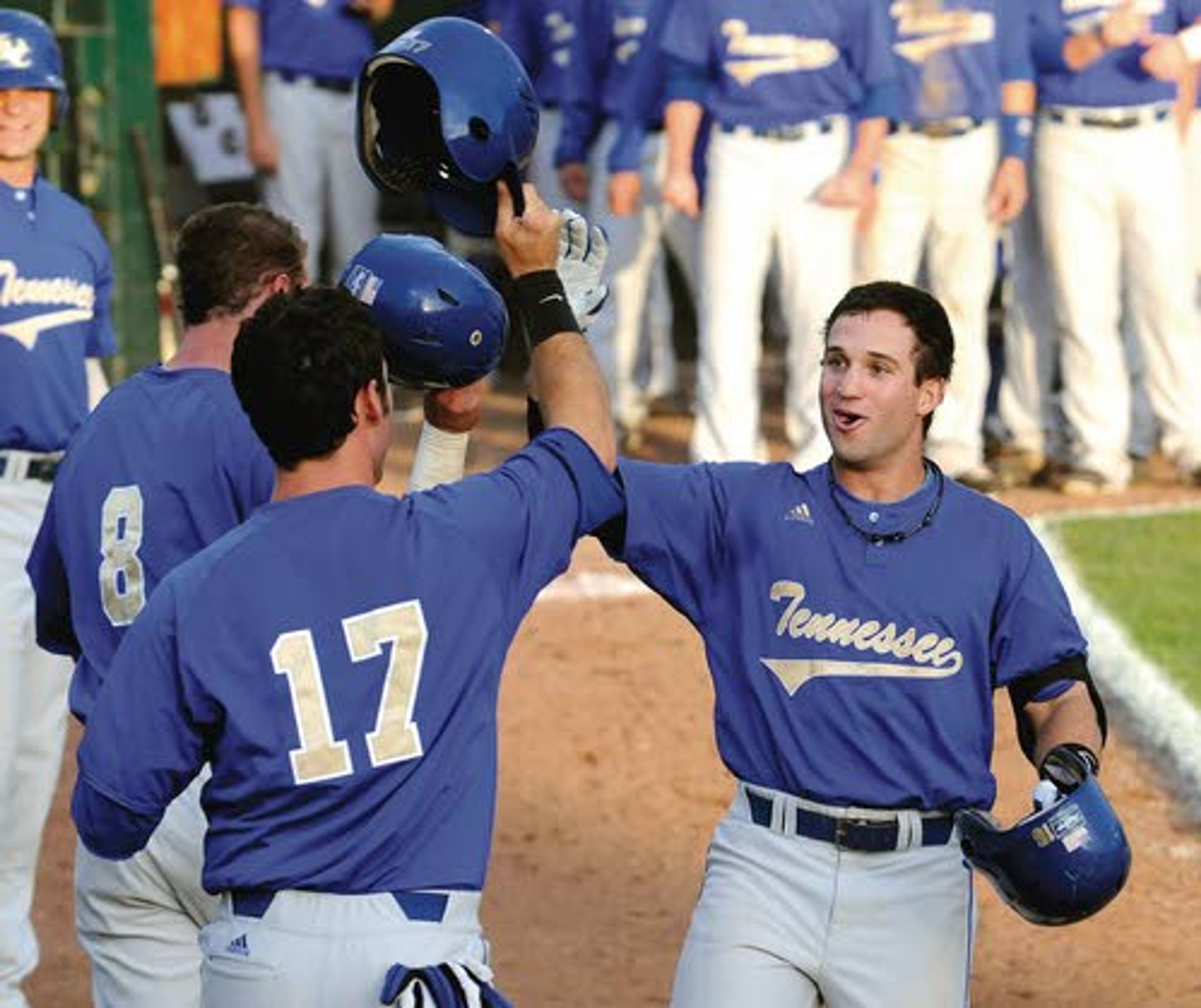 Tennessee Wesleyan’s Stephen Branca (8) and Taylor Oldham (17) greet Jordan Guida at the plate after Guida’s three-run homer in the top of the fifth against Lee on Tuesday at Harris Field.