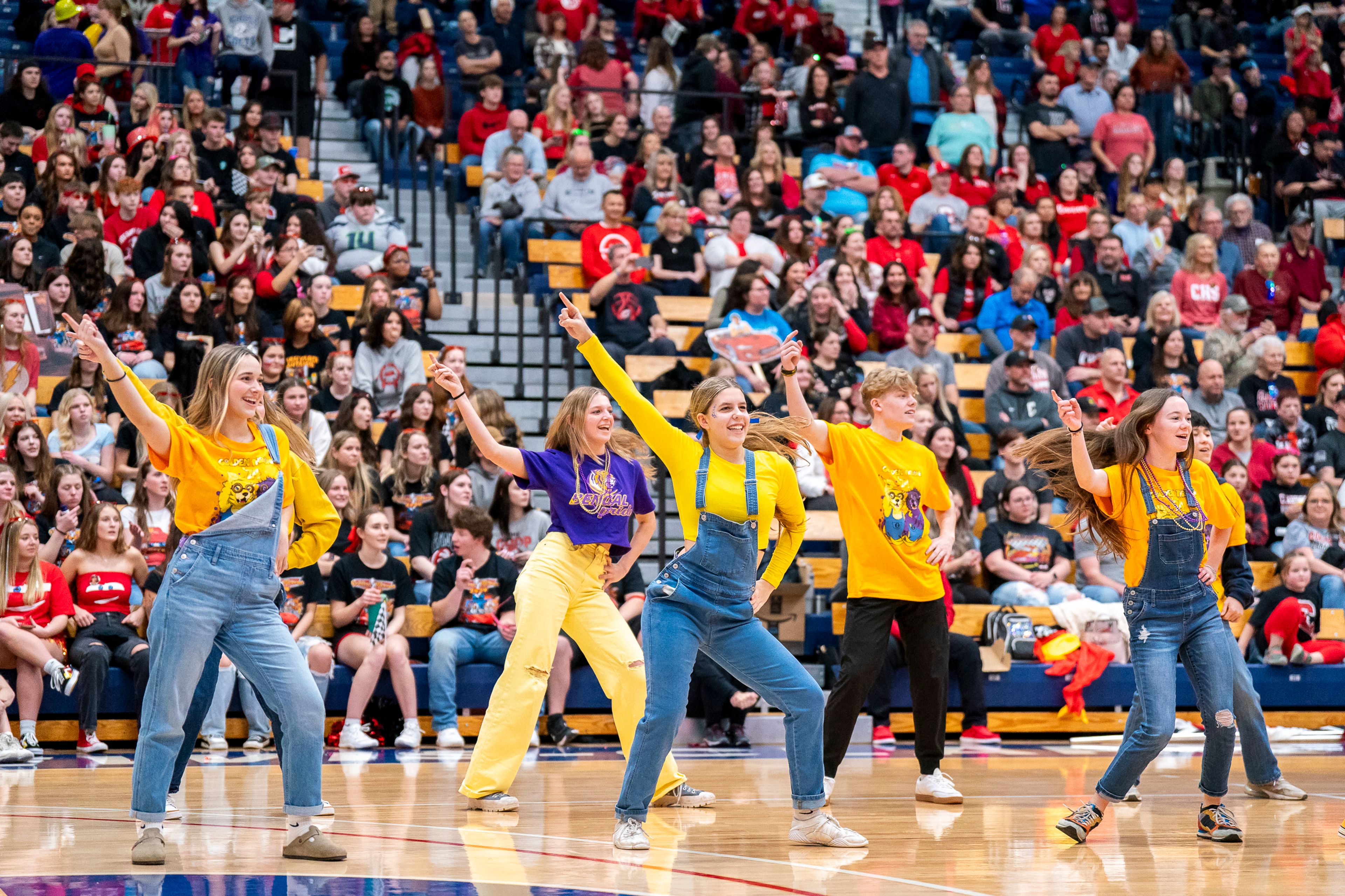 Lewiston High School students dance during halftime of the men’s basketball Golden Throne rivalry game against Clarkston on Friday inside the P1FCU Activity Center in Lewiston.