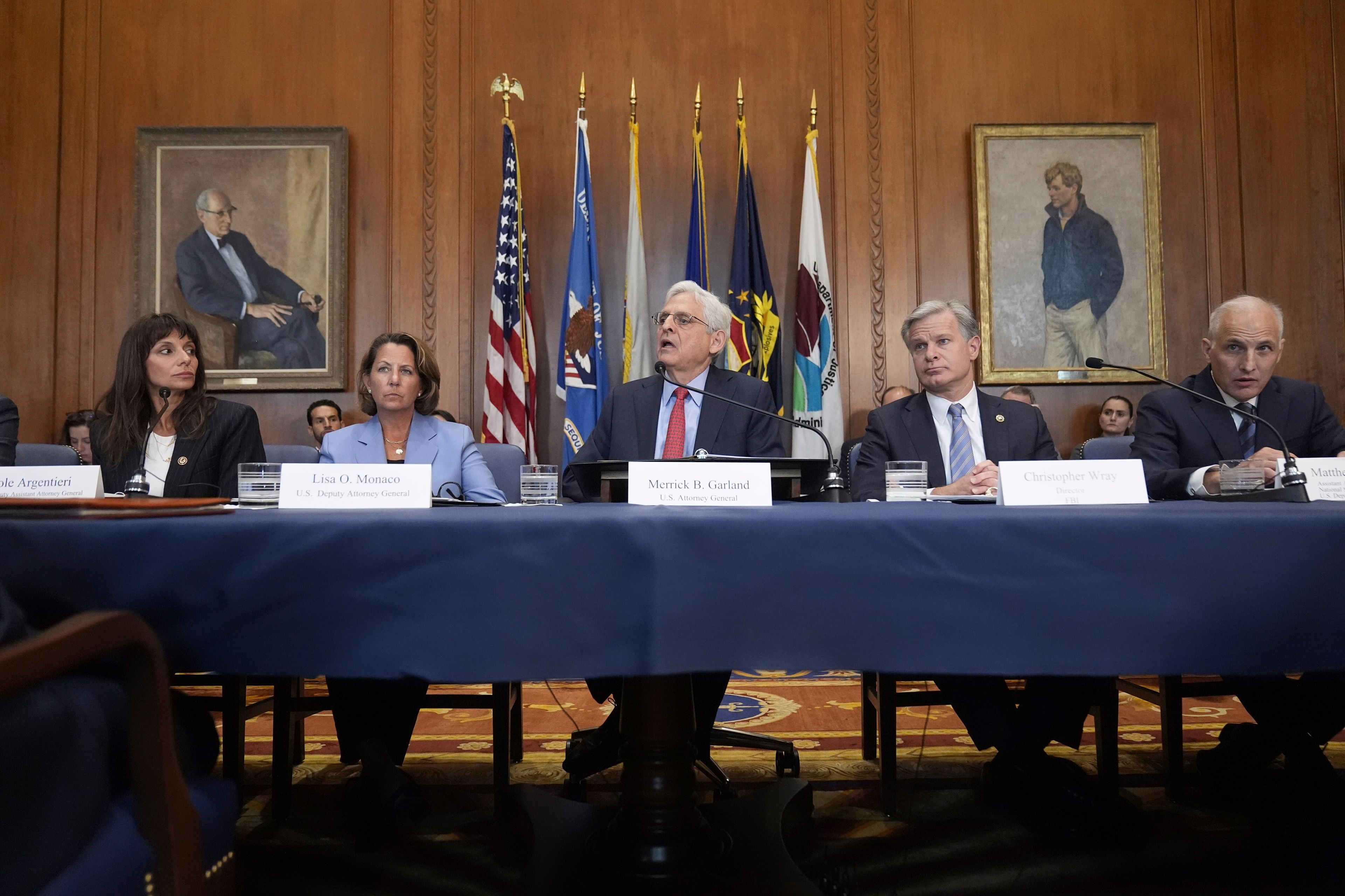 Attorney General Merrick Garland, center, speaks before a meeting of the Justice Department's Election Threats Task Force, at the Department of Justice, Wednesday, Sept. 4, 2024, in Washington, with from left, Deputy Attorney General, Criminal Division, Nicole Argentieri, Deputy Attorney General Lisa Monaco, Garland, FBI Director Christopher Wray and Assistant Attorney General, National Security Division, Matthew Olsen.