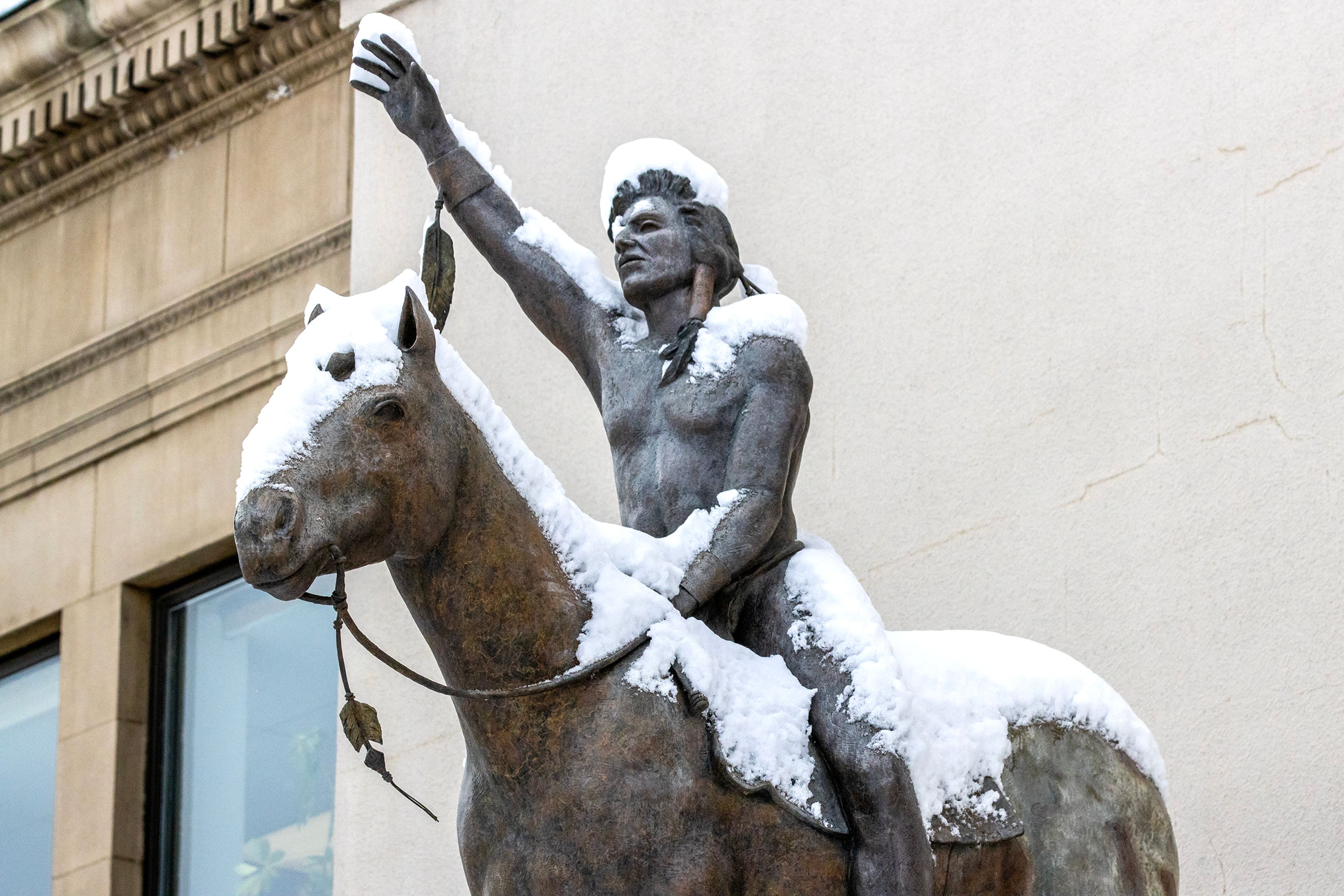 The statue Indian summer sits outside the Nez Perce County Courthouse Friday in Lewiston.