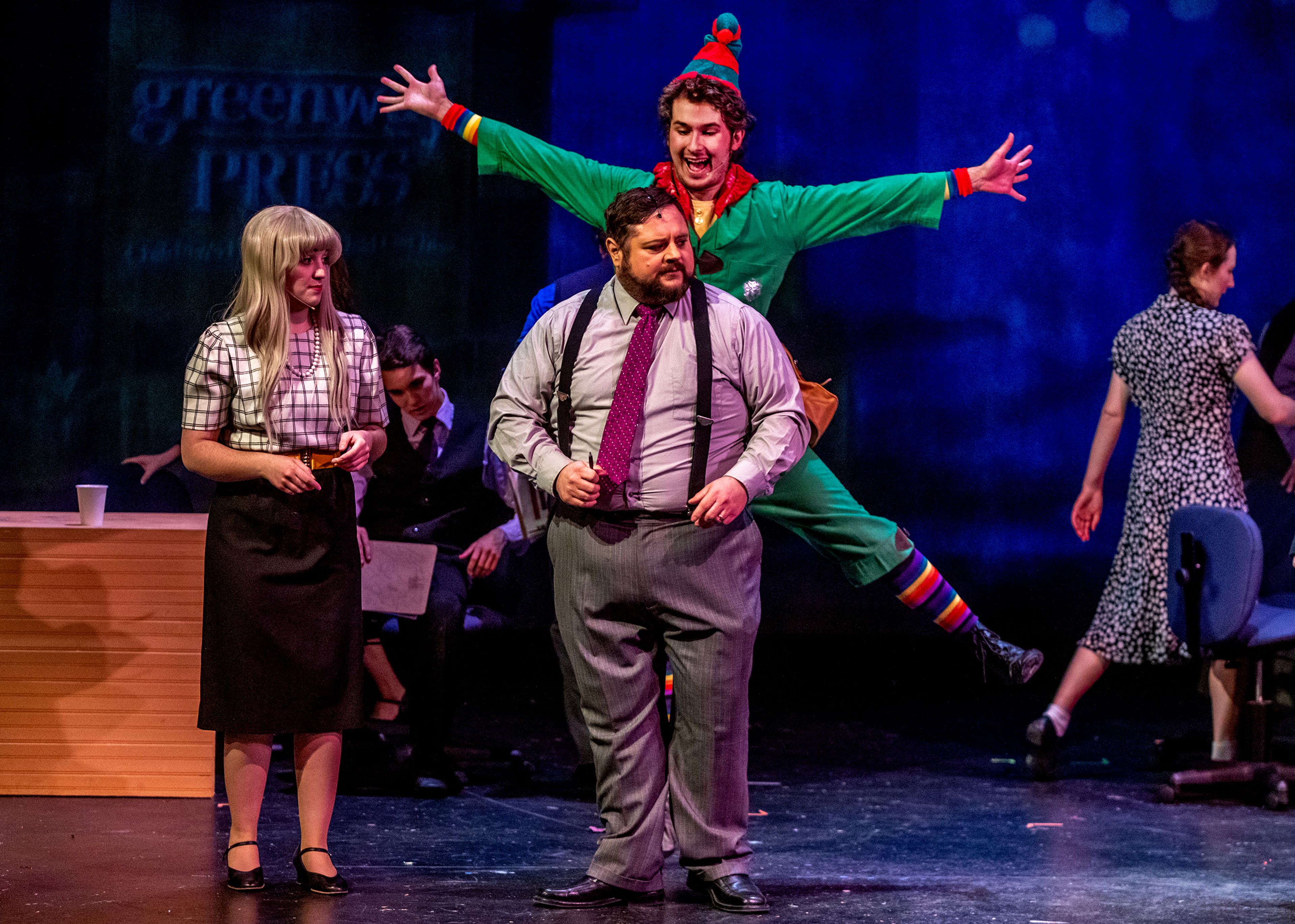 Buddy, played by Alex Everett, leaps out to meet his father Walter Hobbs, played by Cody Stauffer, at a rehearsal for the Civic Theatre production of “Elf” at the old Lewiston High School on Monday.