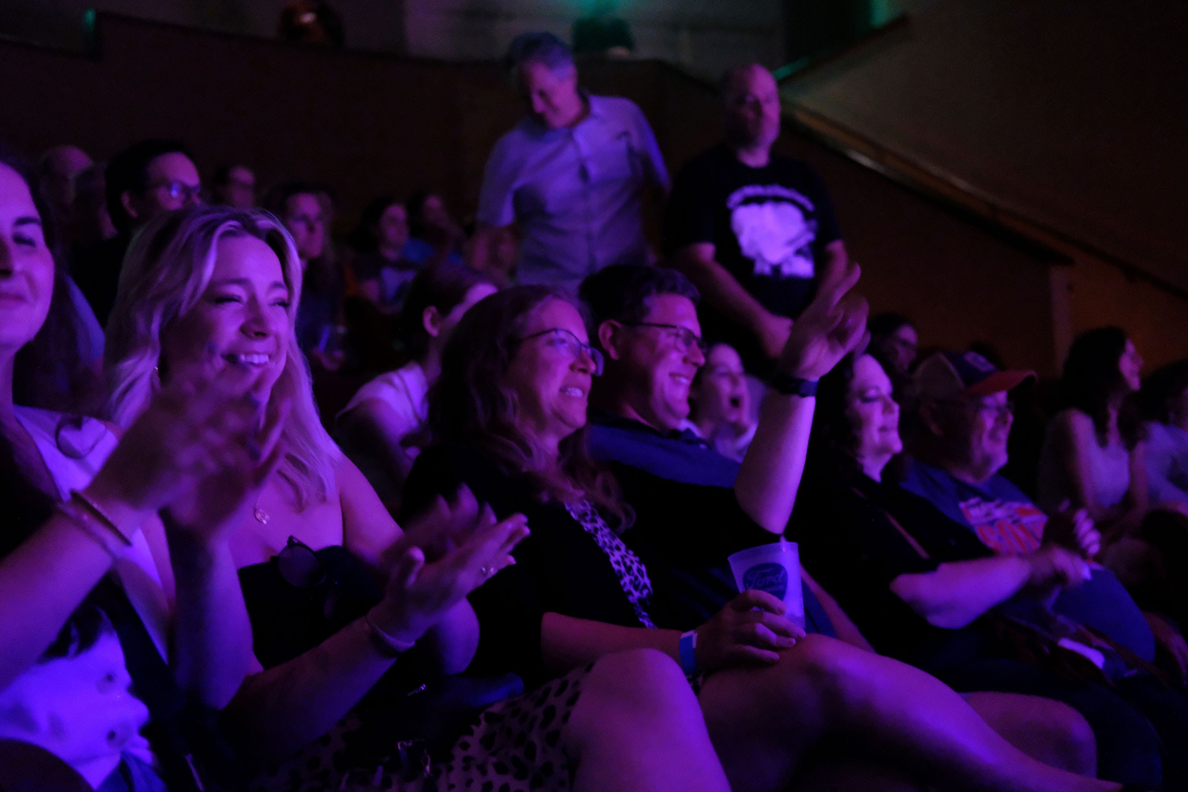 The audience reacts during a performance at the Ryman Auditorium in Nashville, Tenn., on July 30, 2024.