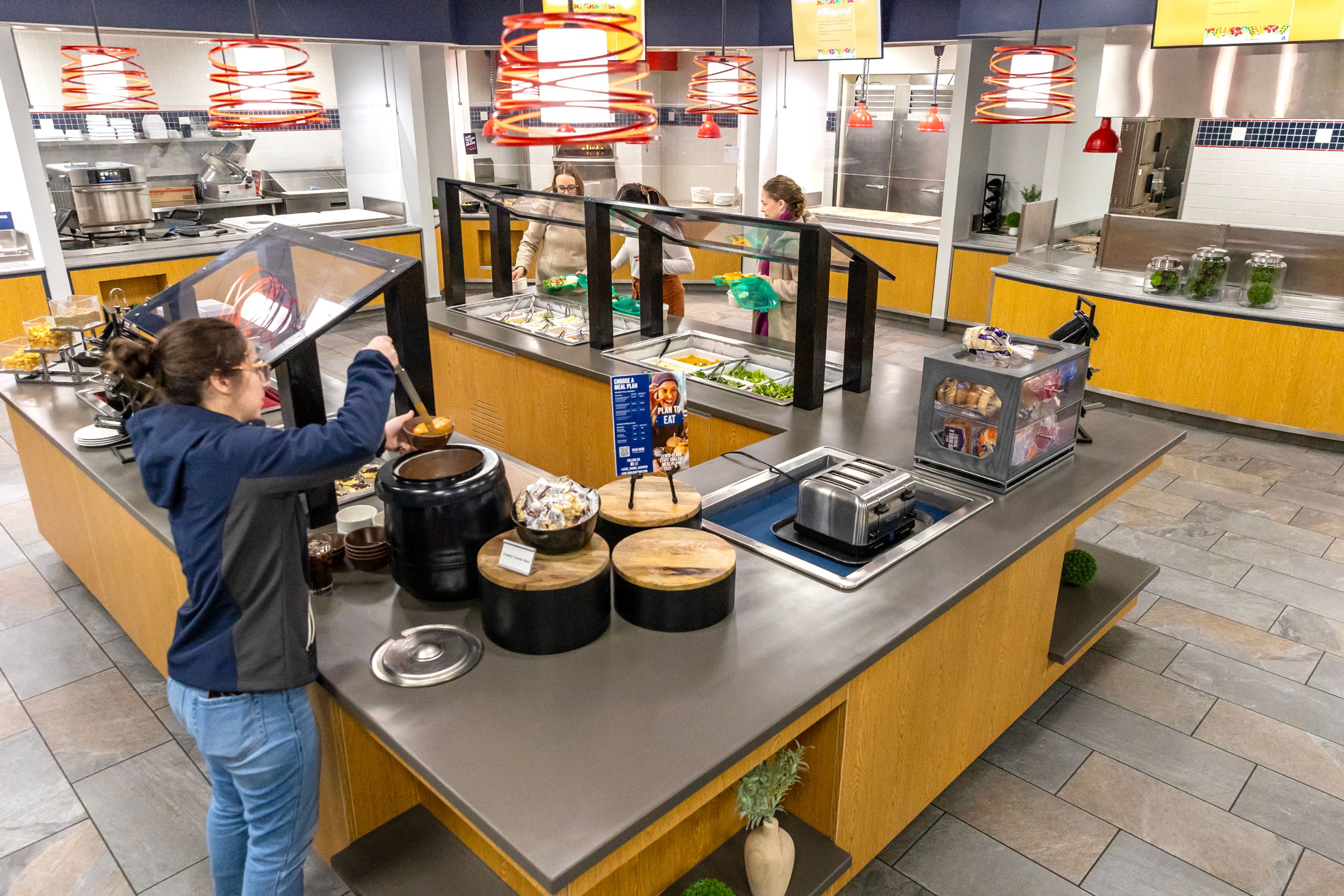 Students get lunch in the newly renovated Student Union Building Wednesday in Lewiston.