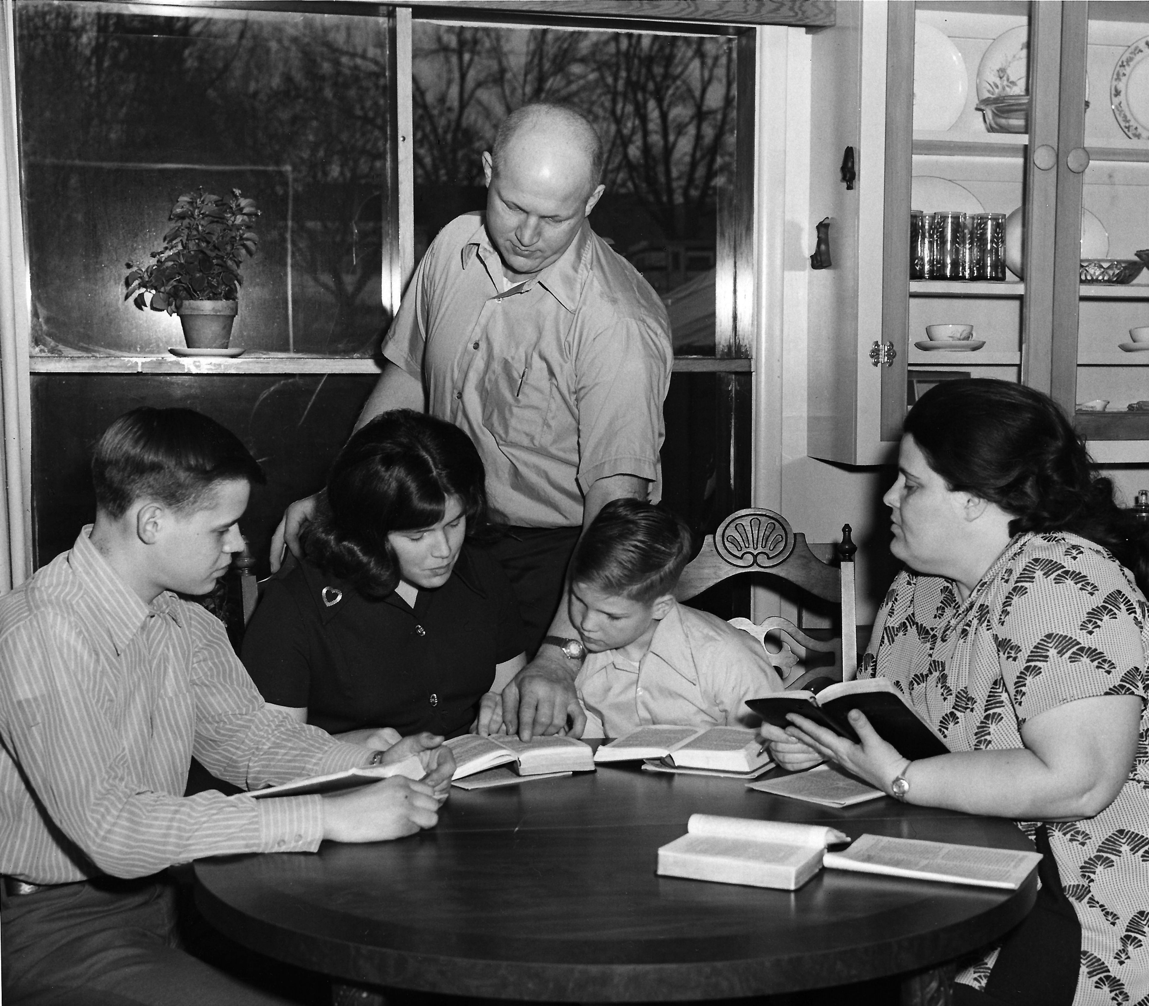 The Overmyer family, of Clarkston, joins together in a Bible study around the table in their Clarkston home in this photo published in the March 25, 1973, Lewiston Tribune. From left are, David, 16; Deborah, 15; Paul Overmyer; Michael, 9; and Betty Overmyer. The acompanying story by reporter Bob Barrows describes the family's loss several months before of their previous Clarkston home in a fire. The family all had been at a church service the night of the fire and so none were injured. Area church congregations donated items to replace what had been lost and they stayed with a family member until securing their new home. Readers who would like to share their historical photos (20 years or older) from throughout the region may do so by emailing them to blasts@lmtribune.com or submitting them to: Blast from the Past, P.O. Box 957, Lewiston, ID 83501. Questions? Call Jeanne M. DePaul at (208) 848-2221.