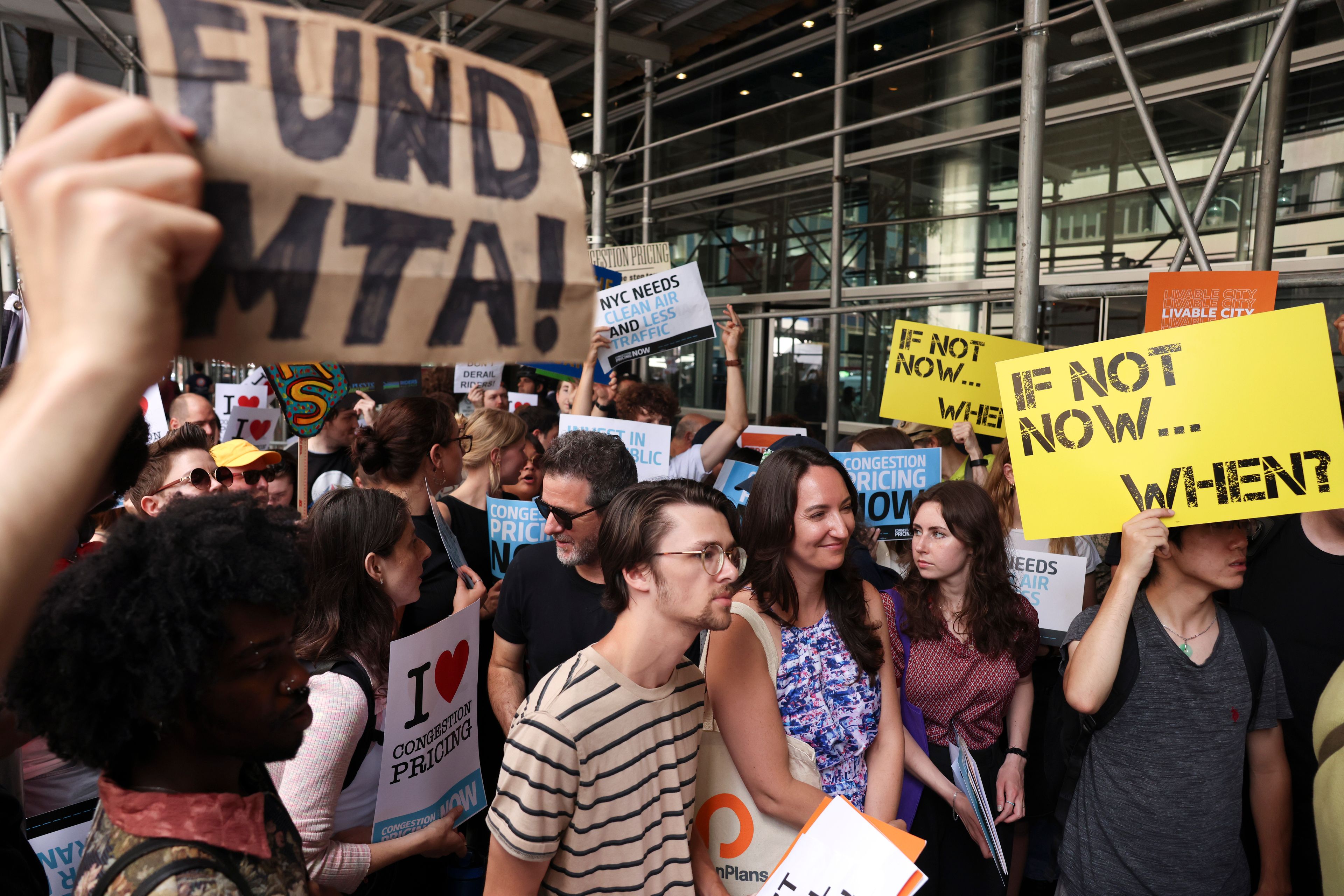 Protesters demonstrate outside New York Gov. Kathy Hochul's Manhattan office, Wednesday, June 5, 2024, in New York. Hochul is indefinitely delaying implementation of a plan to charge motorists big tolls to enter the core of Manhattan, just weeks before the nation's first "congestion pricing" system was set to launch.