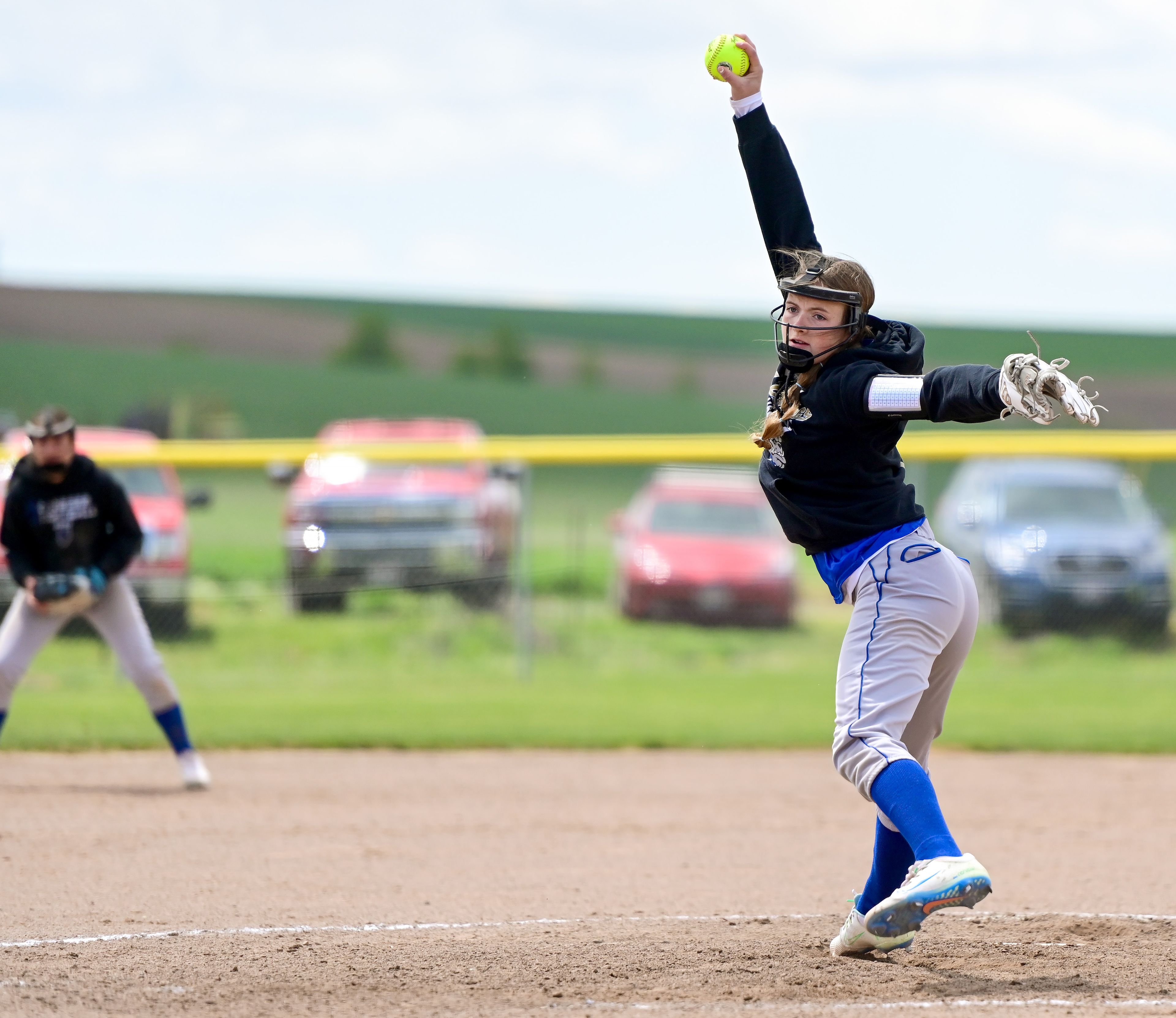 Genesee’s Kendra Meyer winds up to throw a pitch during an Idaho Class 1A state championship game Friday in Genesee..