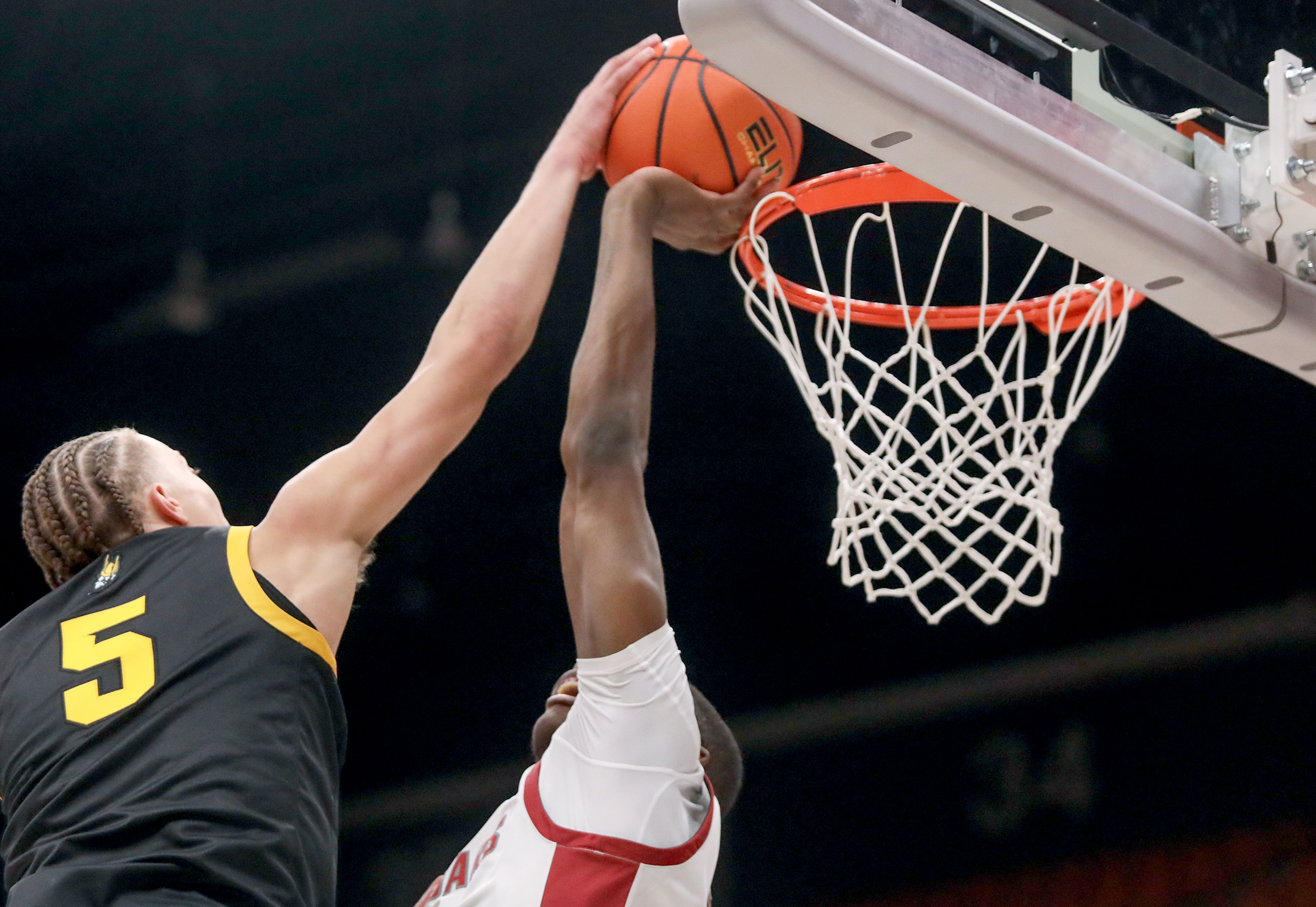 A two-point attempt by Idaho guard Isaiah Brickner is blocked at the rim by Washington State guard Cedric Coward Monday during the Battle of the Palouse game at Beasley Coliseum in Pullman.