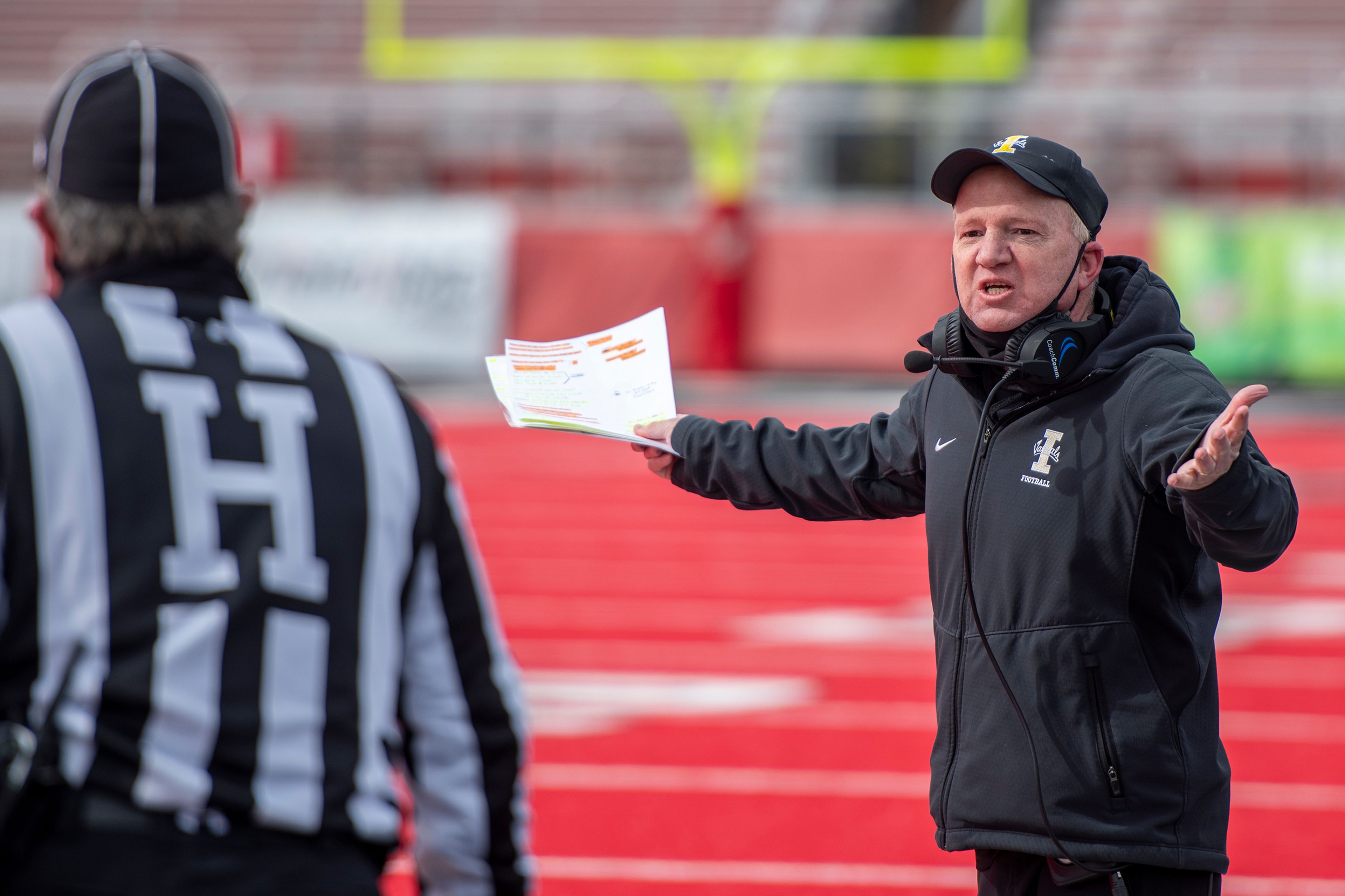 Idaho head coach Paul Petrino argues a call with an official during the third quarter of a Big Sky Conference matchup at Roos Field on Saturday afternoon. Eastern Washington defeated Idaho 38-31.