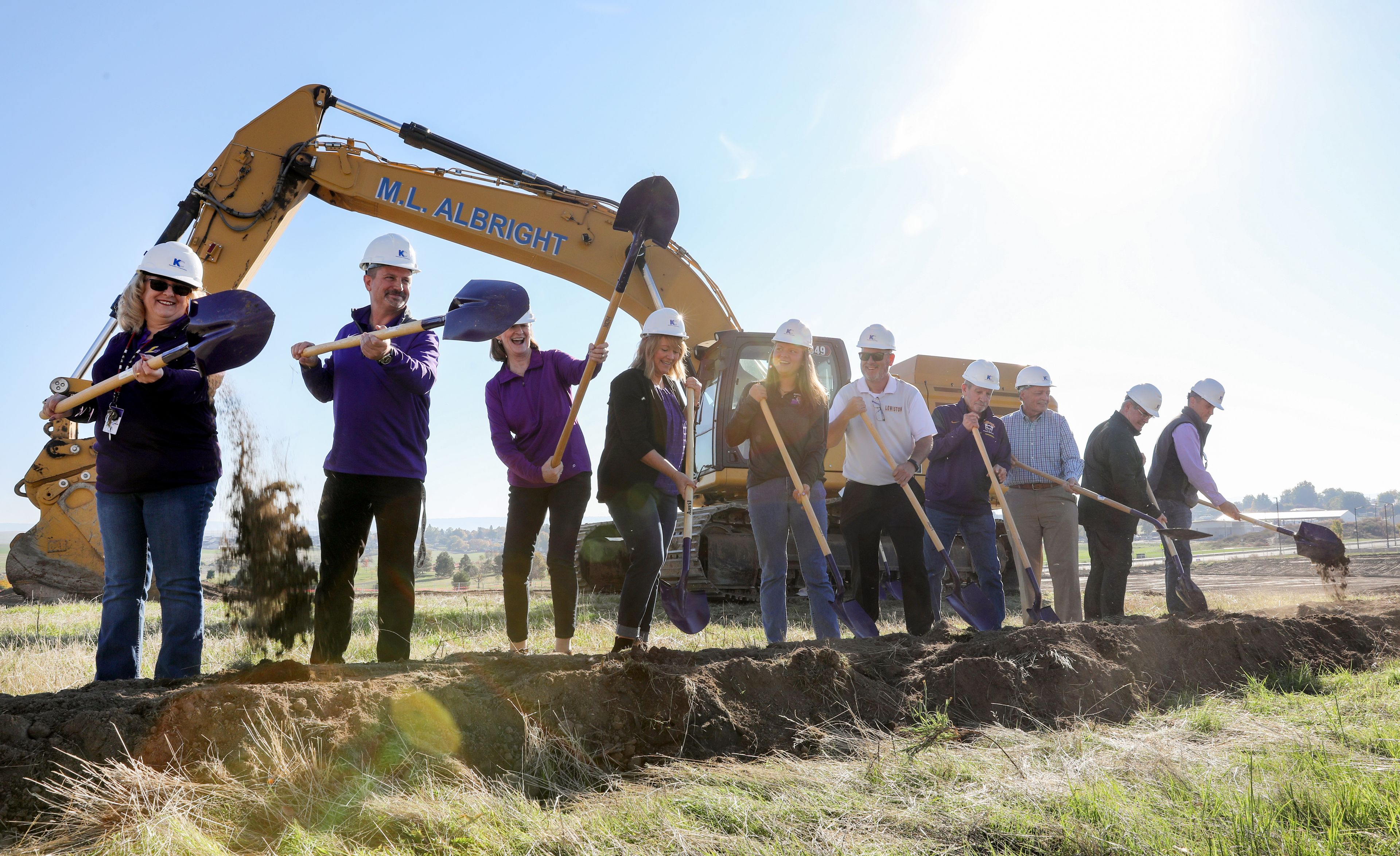 Key players in Lewiston School District and the beginning of Phase II construction on Lewiston High Schools athletic venues turn dirt at a groundbreaking celebration for the start of construction on Saturday.,