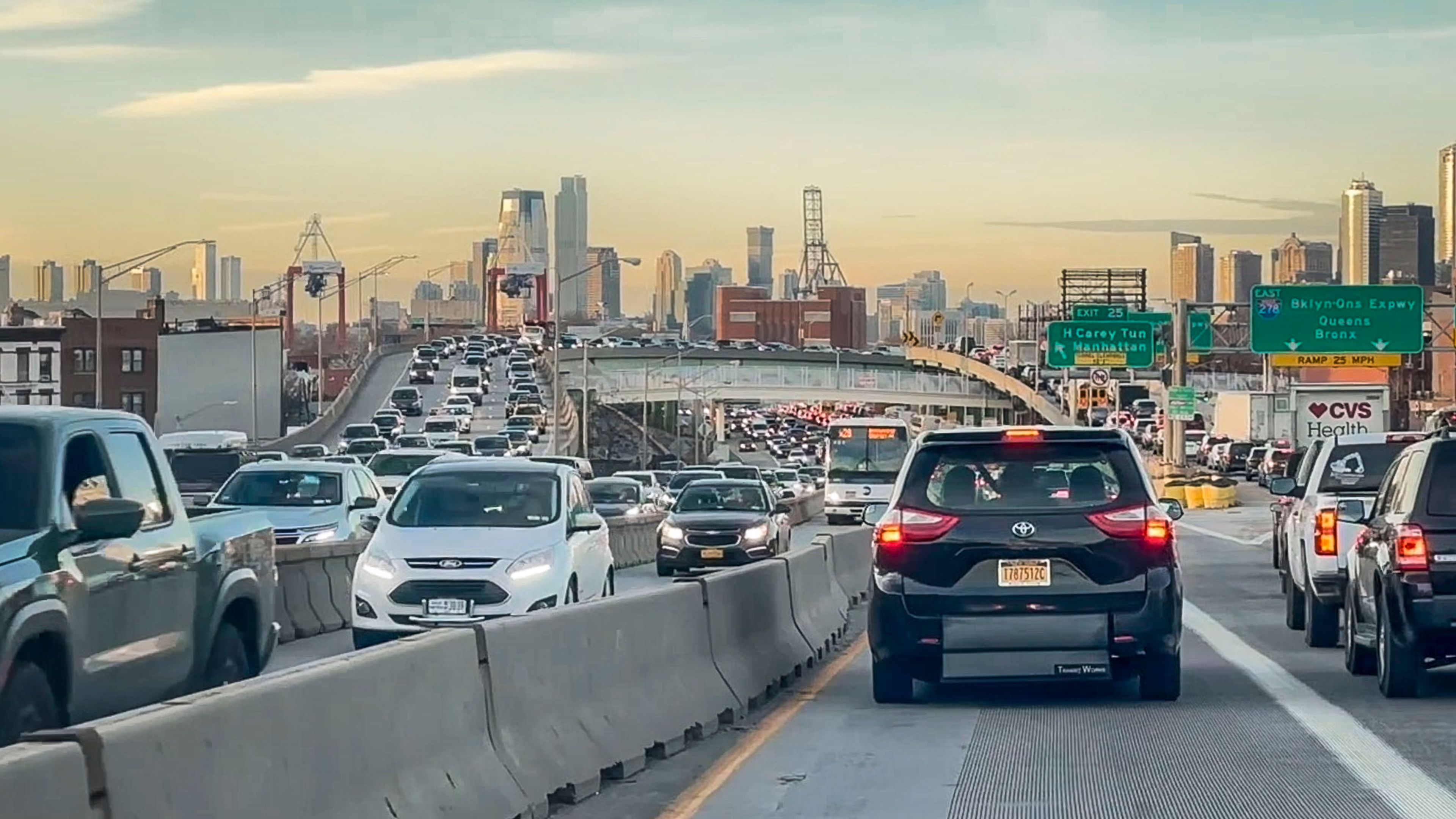 FILE - Traffic is steady as vehicles approach Hugh Carey tunnel linking Brooklyn to Manhattan, Wednesday, Feb. 7, 2024, in New York. New York’s first-in-the-nation plan to levy a hefty toll on drivers entering much of traffic-choked Manhattan is the focus of a legal battle set to play out in federal court Friday, May 17.