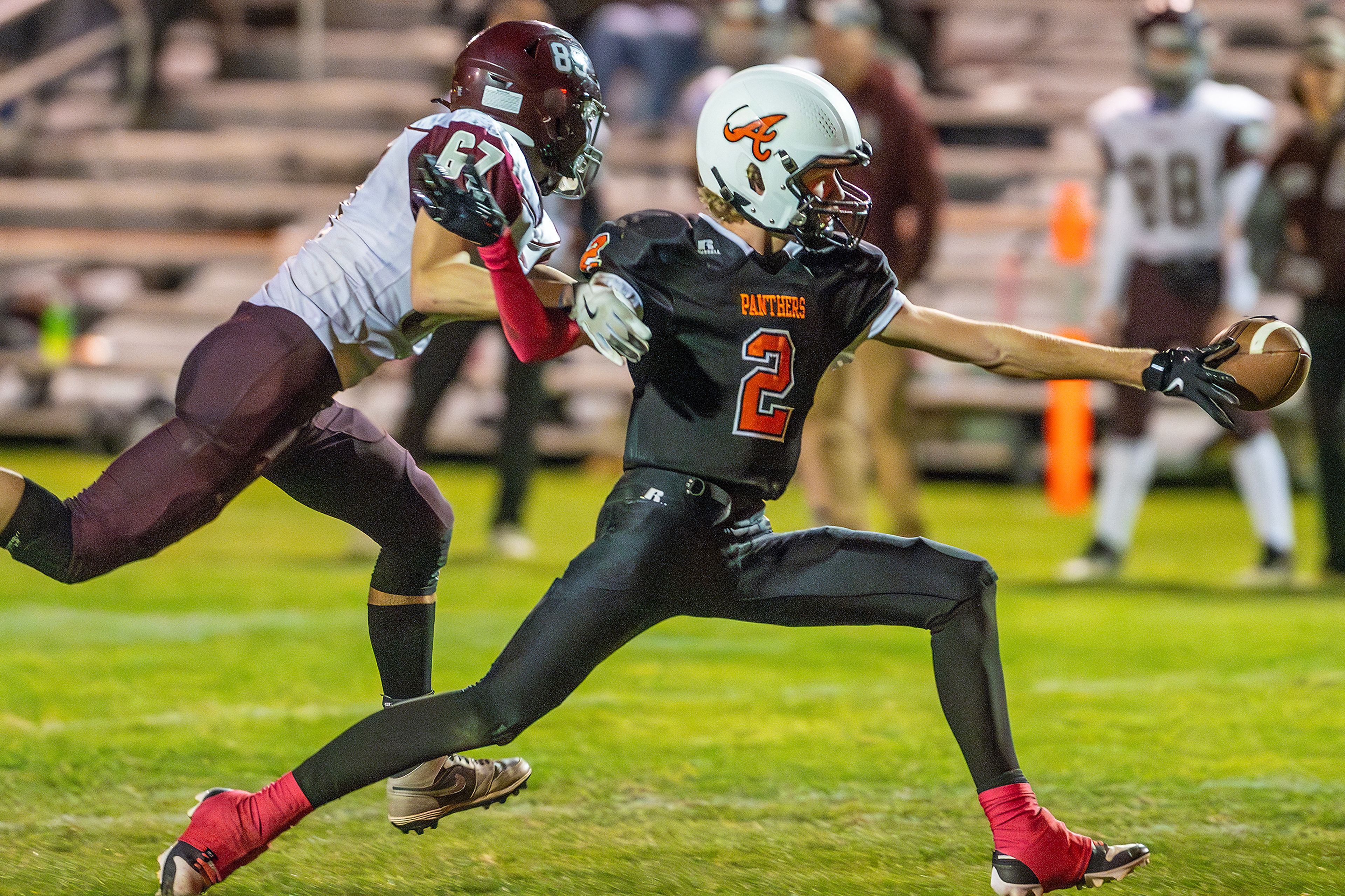 Asotin wide receiver Wyatt Caldwell misses a catch as Reardan works to break up the pass during a Northeast 2B League game Friday in Asotin.,