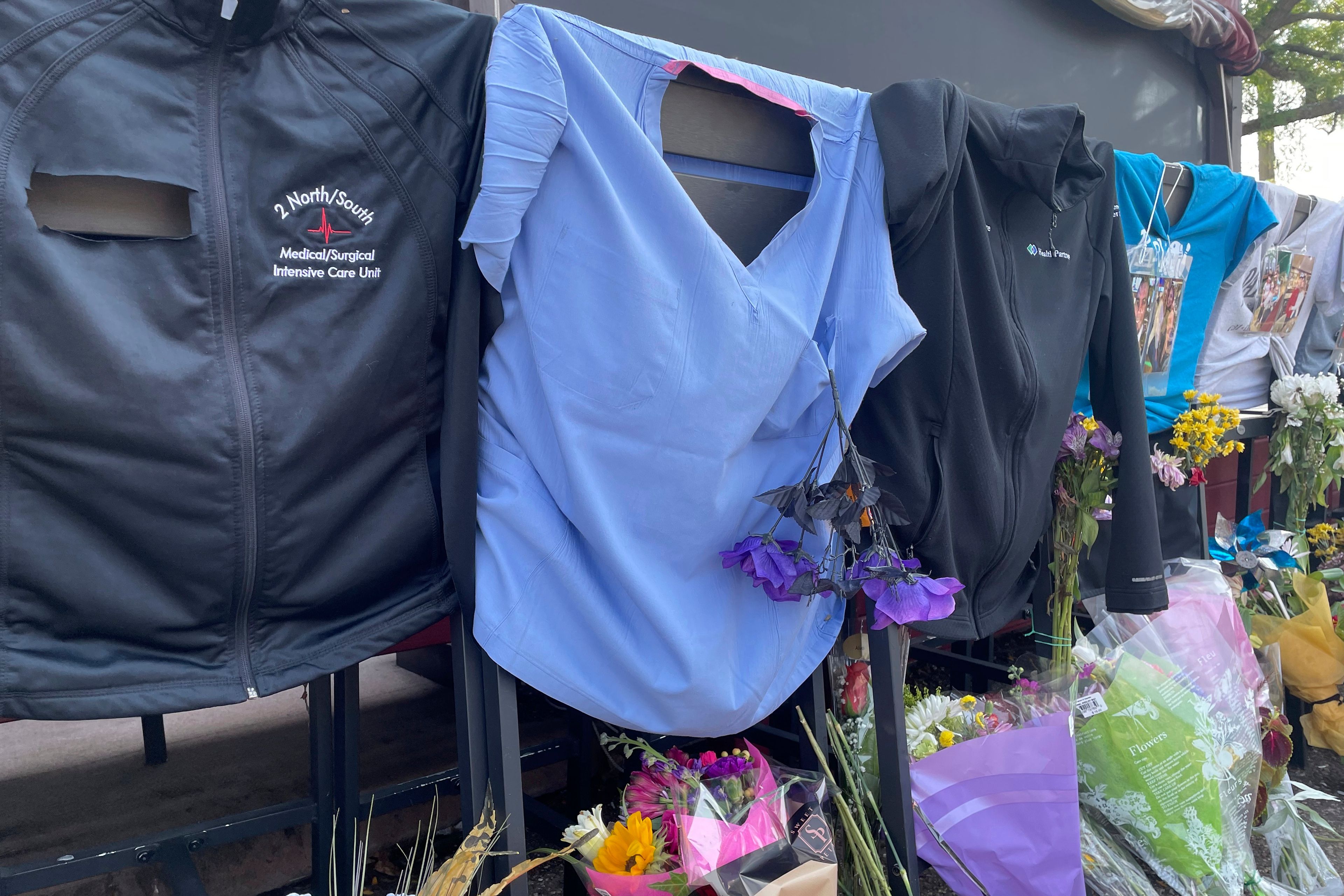 A memorial is seen on display Tuesday, Sept. 3, 2024, outside the Park Tavern in St. Louis Park, Minn., where two people died and at least four were injured Sunday, Sept. 1, after a man drove his car through the restaurant's patio.