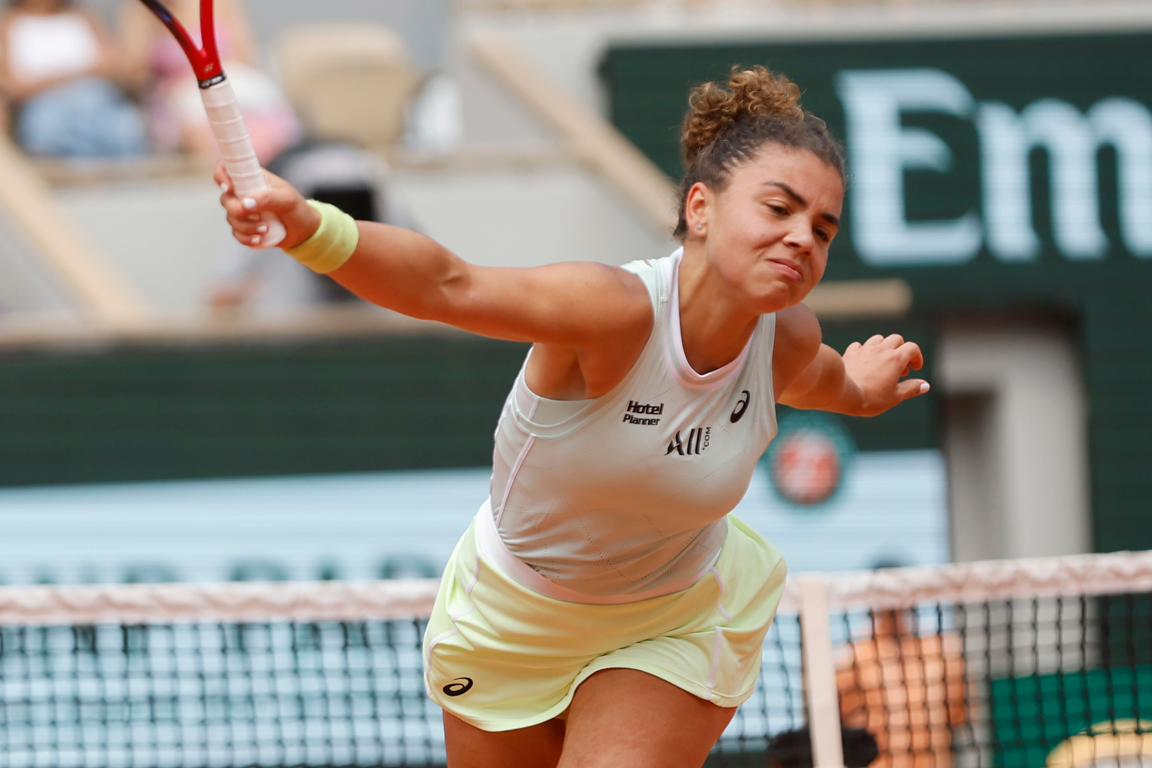 Italy's Jasmine Paolini plays a shot against Poland's Iga Swiatek during the women's final of the French Open tennis tournament at the Roland Garros stadium in Paris, France, Saturday, June 8, 2024.