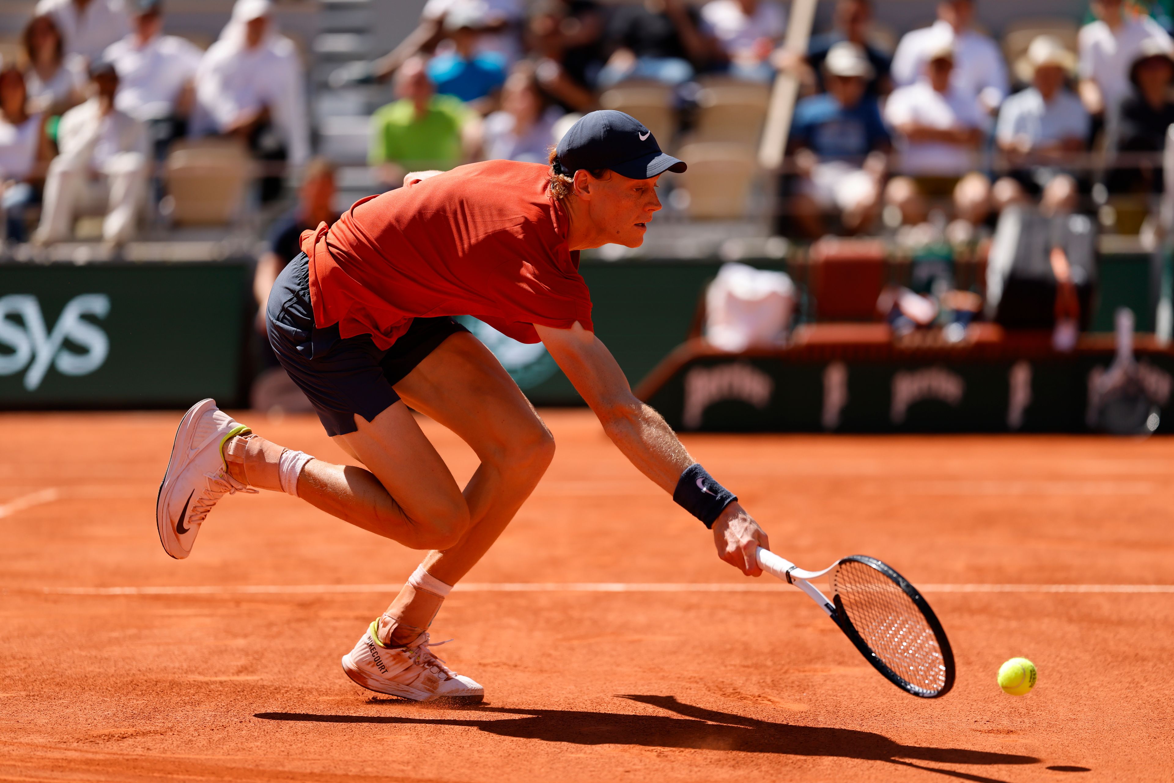 Italy's Jannik Sinner plays a shot against Spain's Carlos Alcaraz during their semifinal match of the French Open tennis tournament at the Roland Garros stadium in Paris, Friday, June 7, 2024.