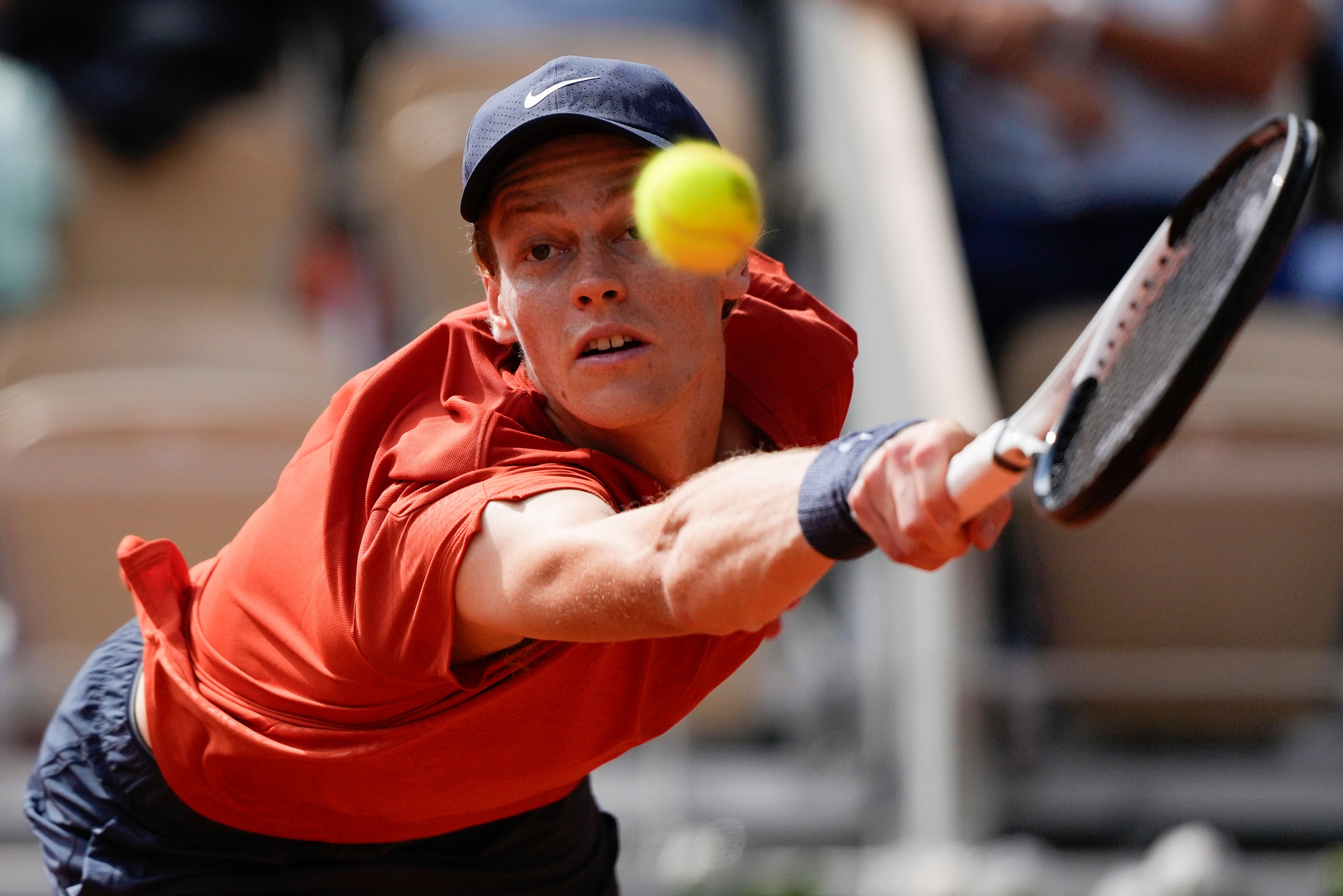 Italy's Jannik Sinner plays a shot against Bulgaria's Grigor Dimitrov during their quarterfinal match of the French Open tennis tournament at the Roland Garros stadium in Paris, Tuesday, June 4, 2024.