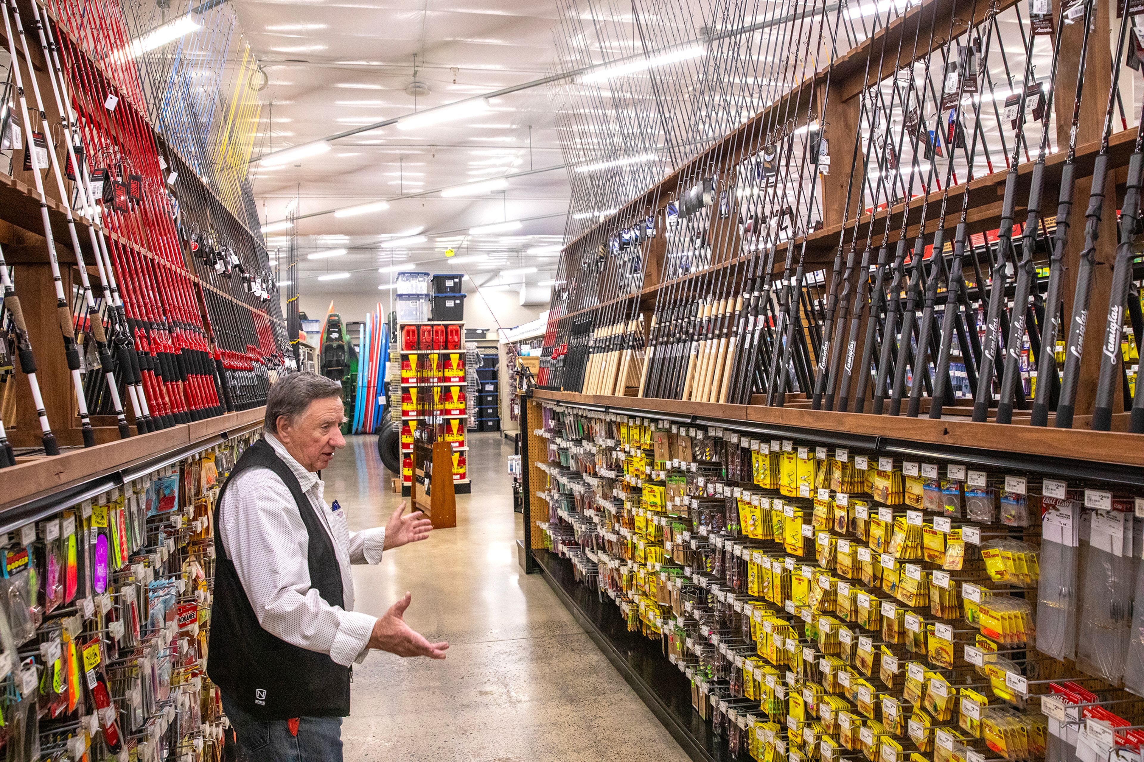 John Snaza talks about the walleye section Wednesday at North 40 Outfitters in Lewiston.