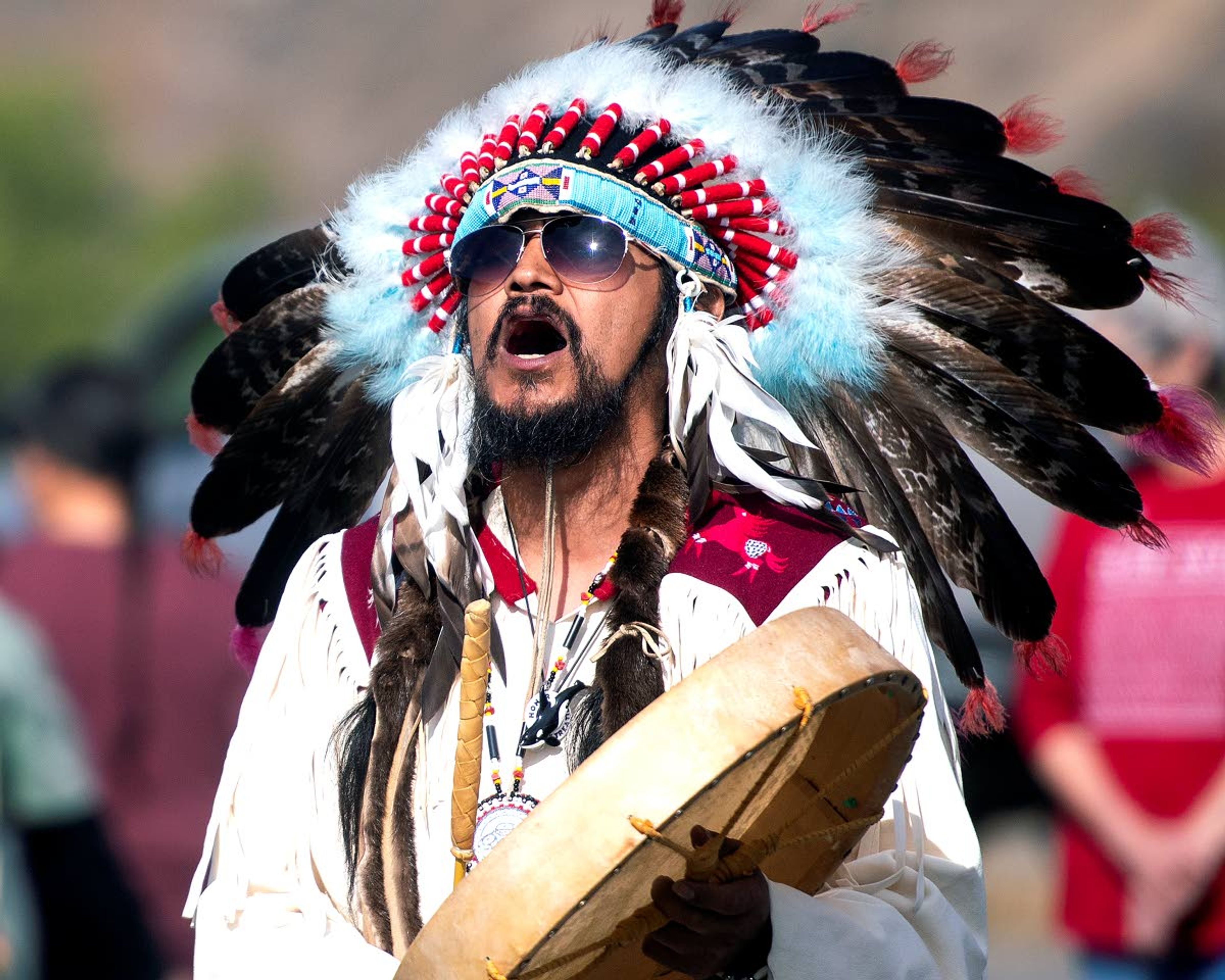 Charleton J.C. Nightwalker recites a prayer song prior to dozens of boats, canoes and kayaks hitting the water for the Nimiipuu River Rendezvous at the Asotin Boat Ramp on Saturday morning.