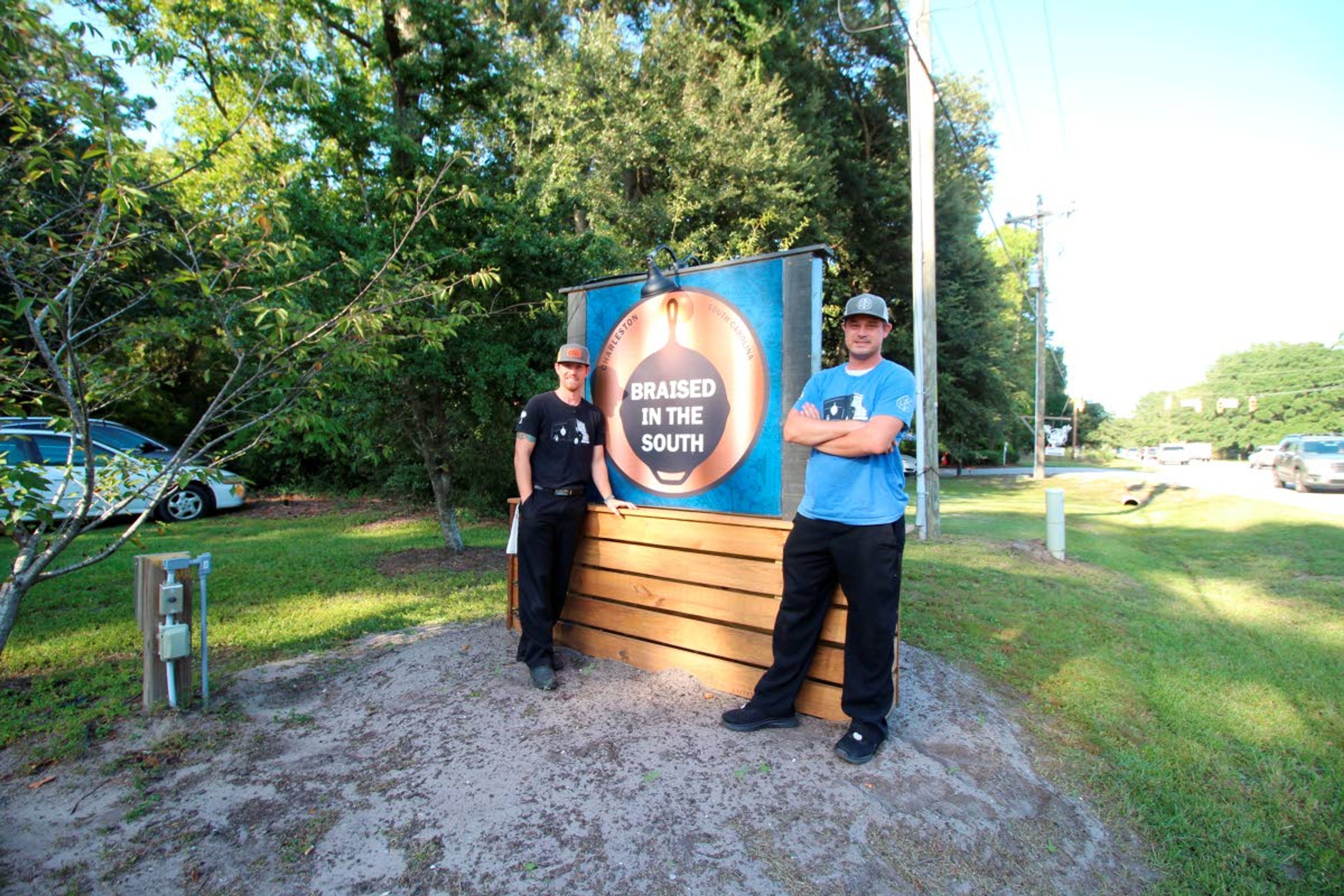 This photo from Sept. 23, 2020, shows Steve Klatt, left, and Brandon Lapp, owners of Braised in the South, a Johns Island, S.C., restaurant and food truck business that is having trouble finding workers during the pandemic.