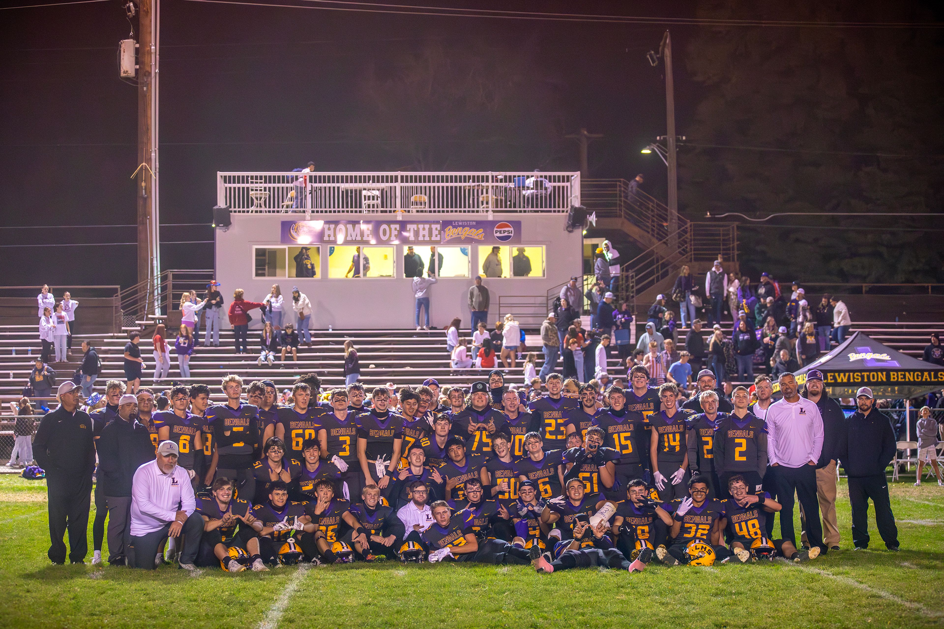 Lewiston poses for a photo on Bengal Field after defeating Hermiston in the last game at Bengal Field before moving to the new field Friday in Lewiston.,