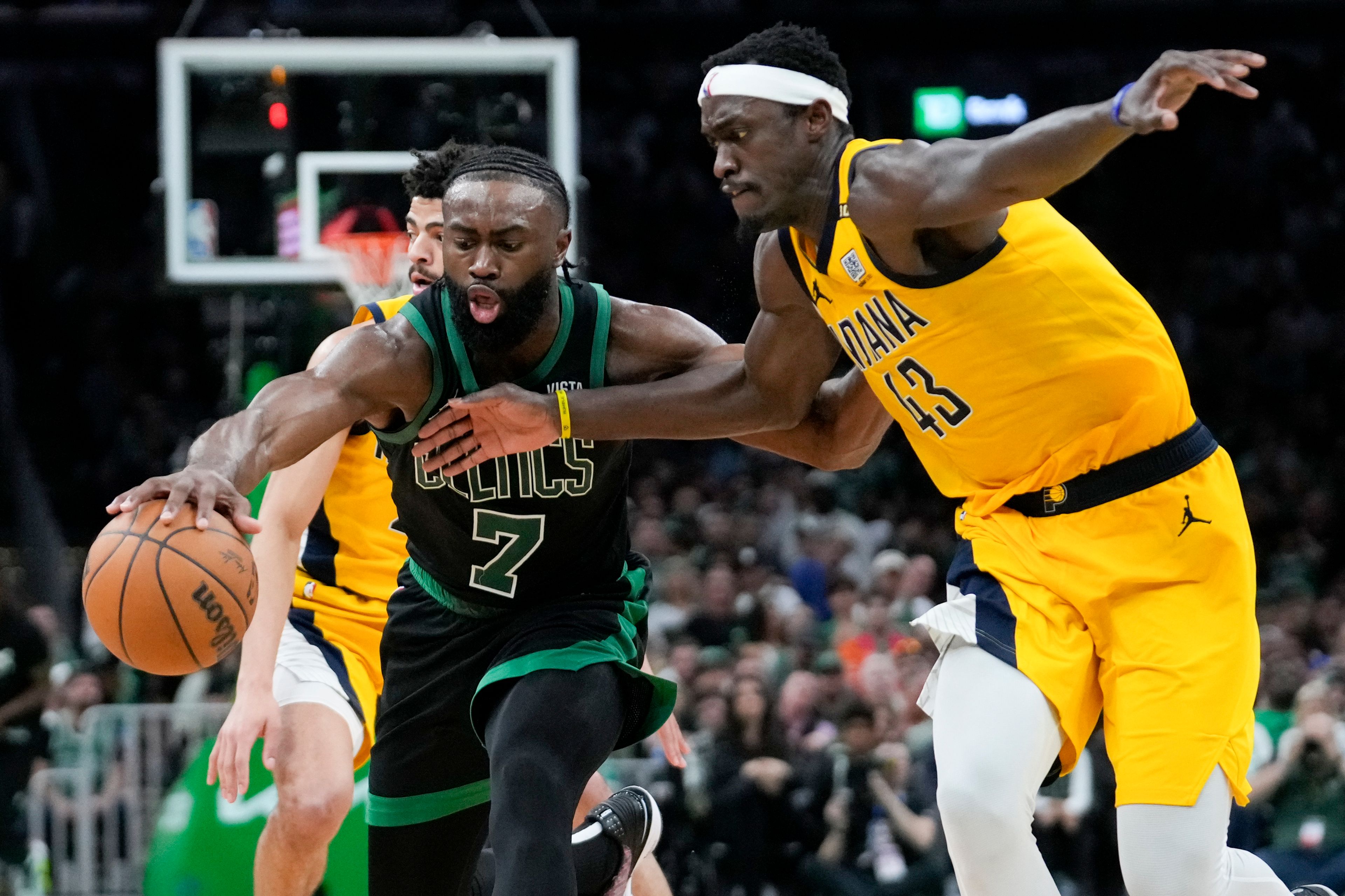 Celtics guard Jaylen Brown (7) is defended by Pacers forward Pascal Siakam (43) during the second half of Game 2 of the Eastern Conference finals Thursday in Boston.