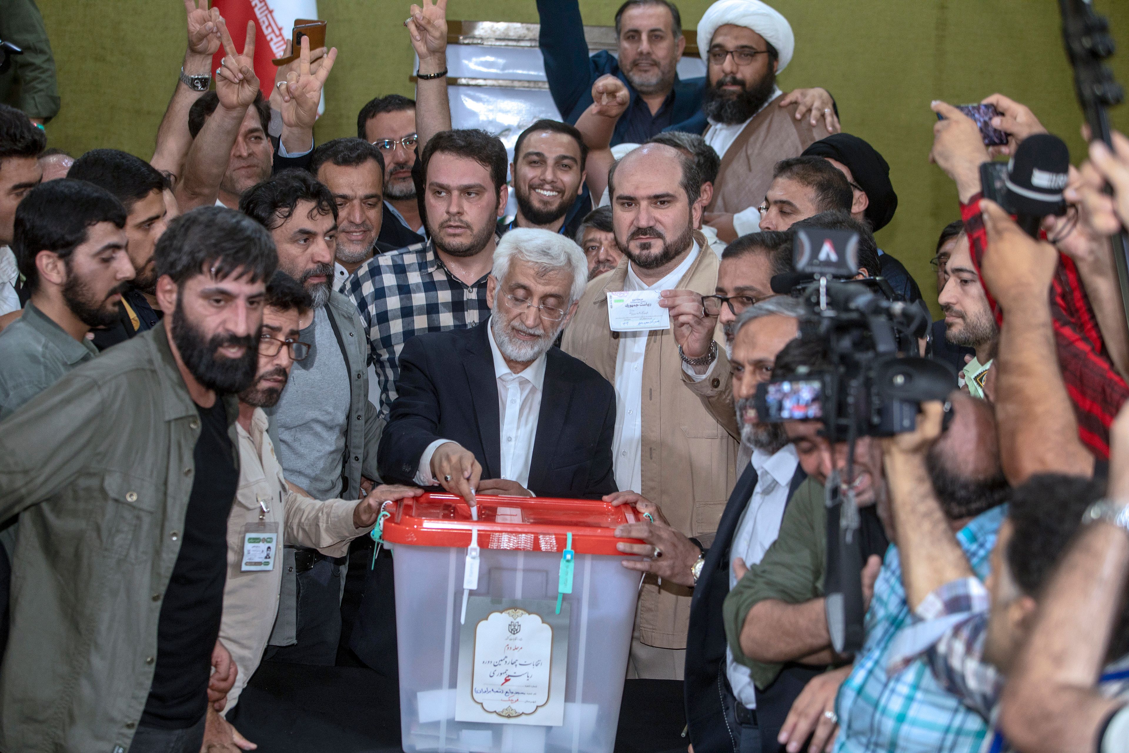 Candidate for the Iran's presidential election Saeed Jalili, a hard-line former nuclear negotiator, casts his vote for the presidential runoff election at a polling station in Qarchak near Tehran, Iran, Friday, July 5, 2024. Iran was holding a runoff presidential election Friday pitting a hard-line former nuclear negotiator against a reformist lawmaker, though both men earlier struggled to convince a skeptical public to cast ballots in the first round that saw the lowest turnout in the Islamic Republic's history. (AP Photo)