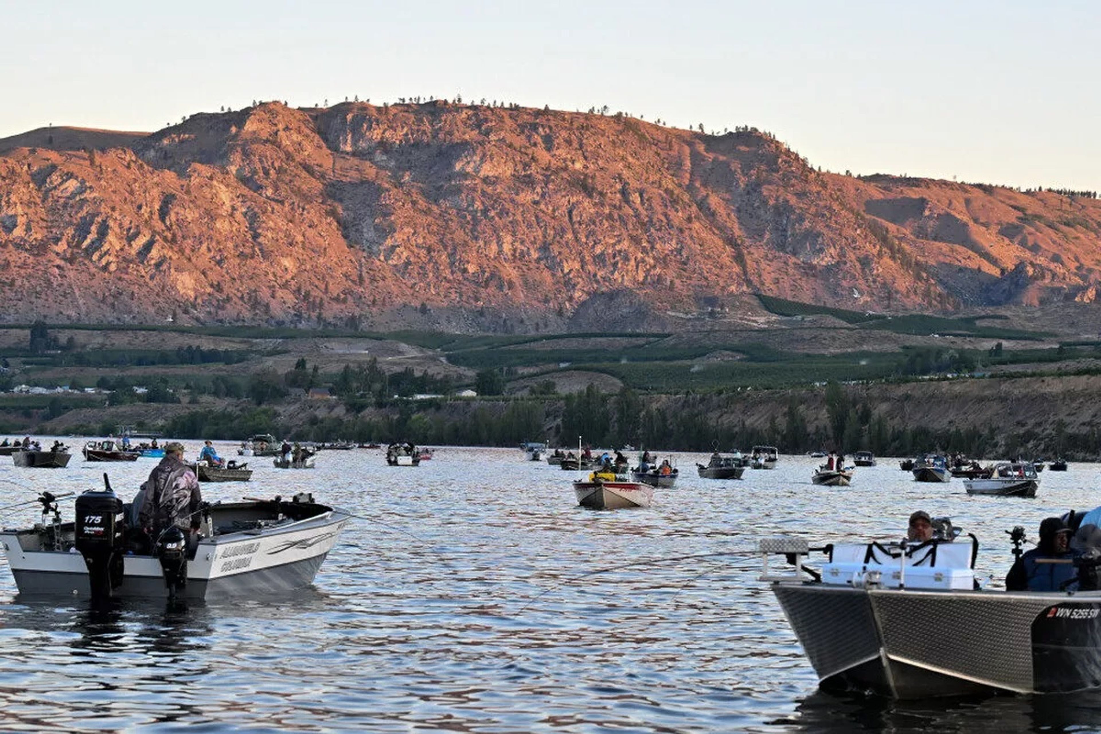 It’s close quarters fishing as anglers troll for salmon in the Columbia River near Brewster, Wash., in this file photo from 2023.