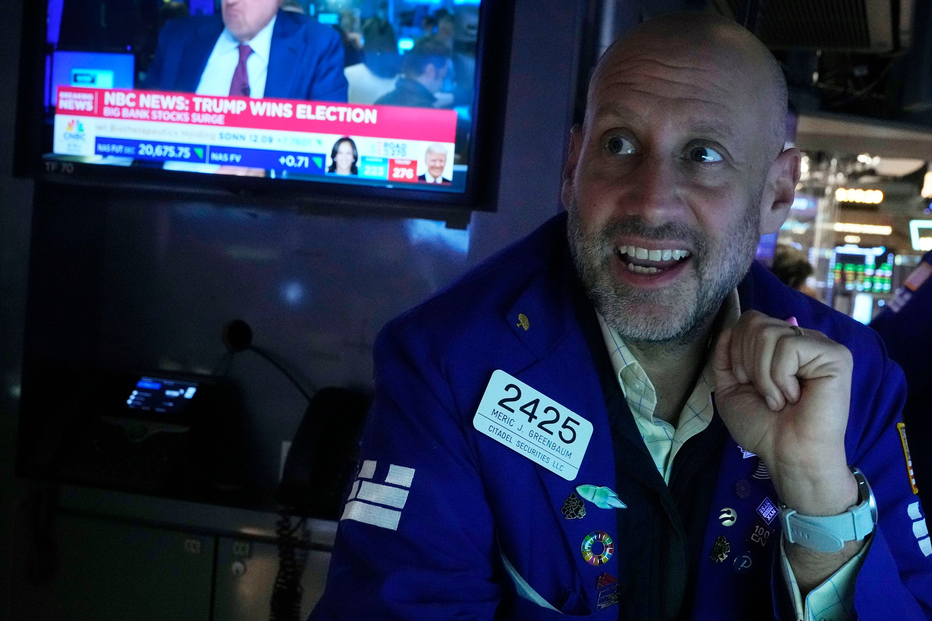 Specialist Meric Greenbaum works at his post on the floor of the New York Stock Exchange, Wednesday, Nov. 6, 2024. (AP Photo/Richard Drew)