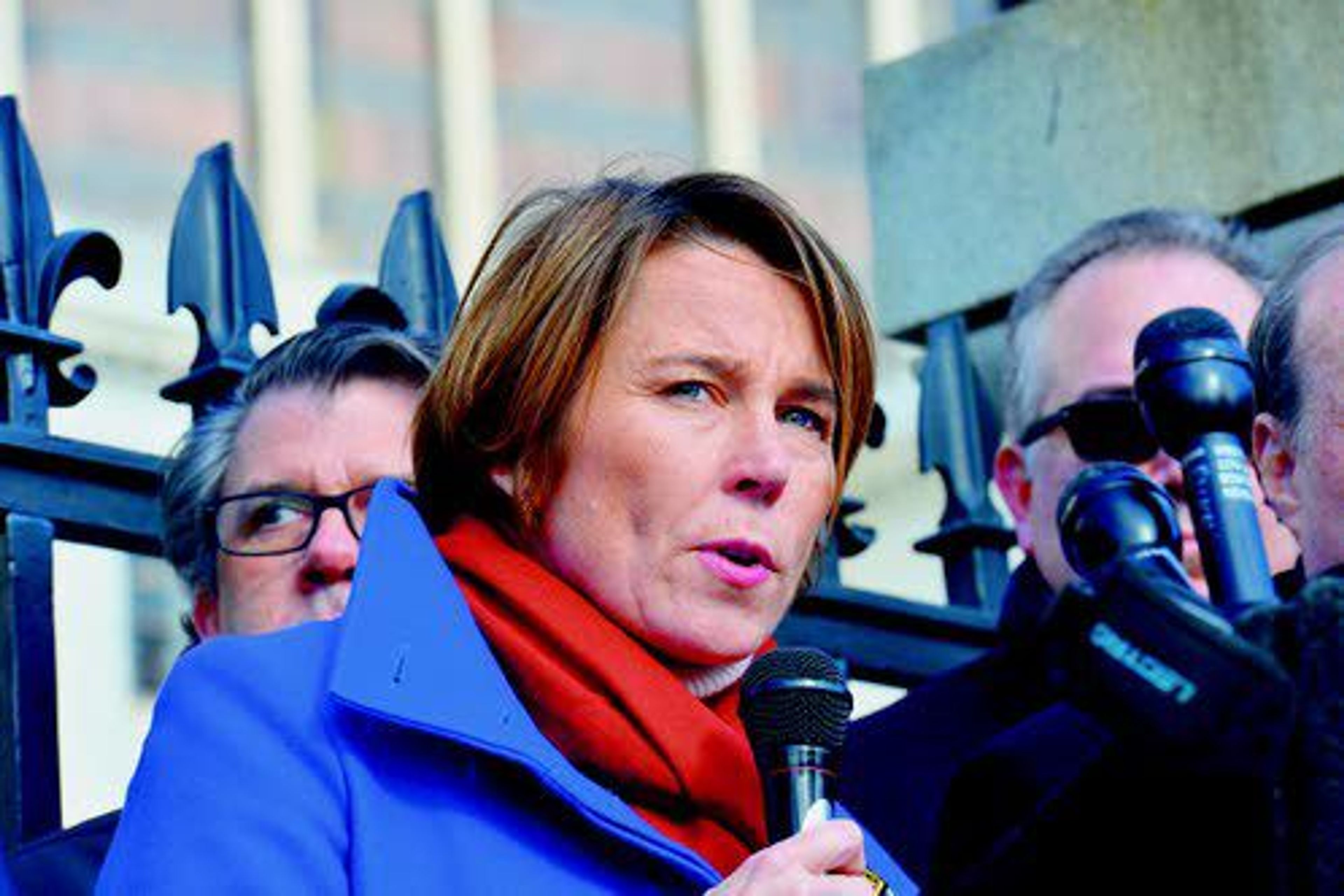 Massachusetts Attorney General Maura Healey speaks to the media Nov. 17, 2016, on the steps of the Massachusetts State House in Boston, Mass.