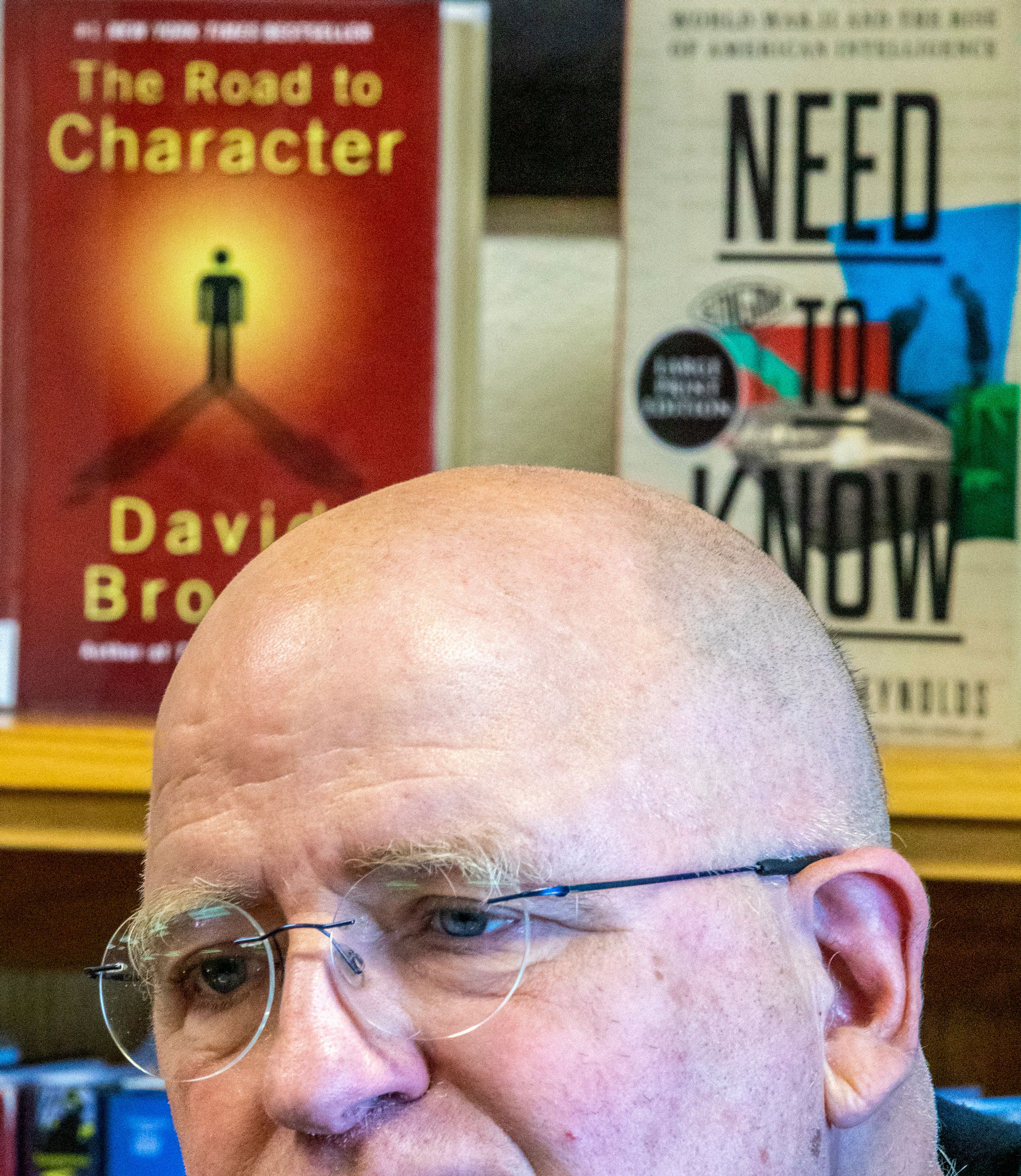 Mike Davisson discusses being awarded a state library volunteer award at the Winchester Community Library Thursday in Winchester.