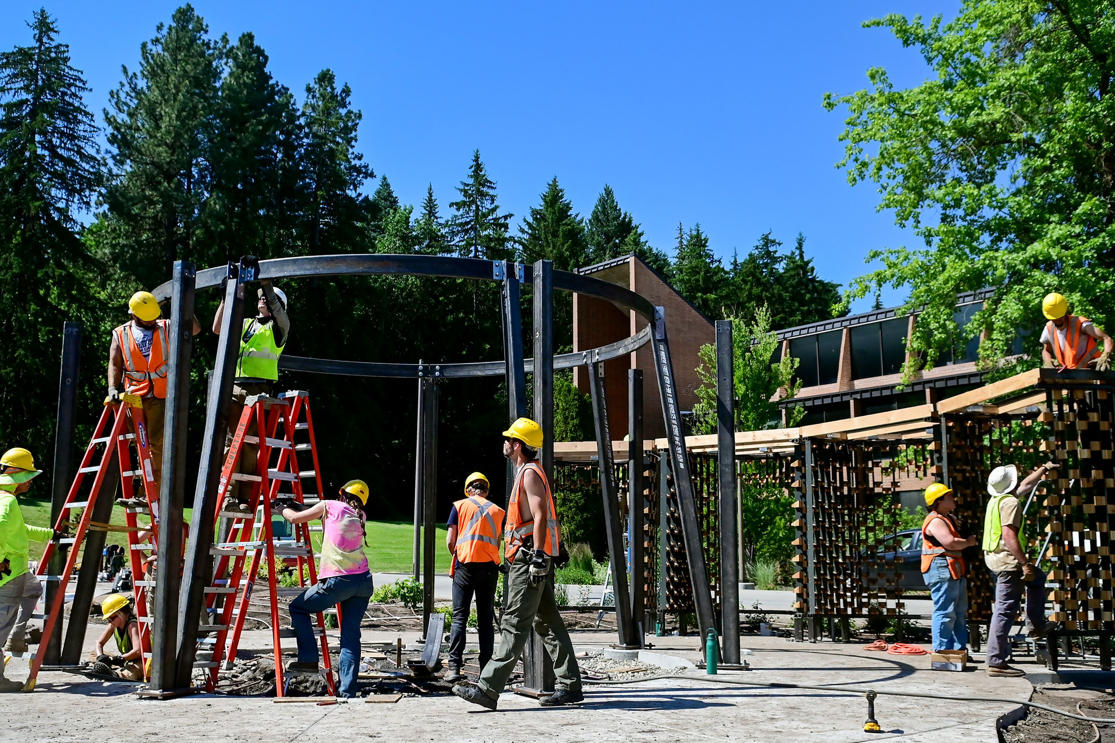 University of Idaho architecture students work to build the Vandal Healing Garden and Memorial in Moscow on Tuesday.