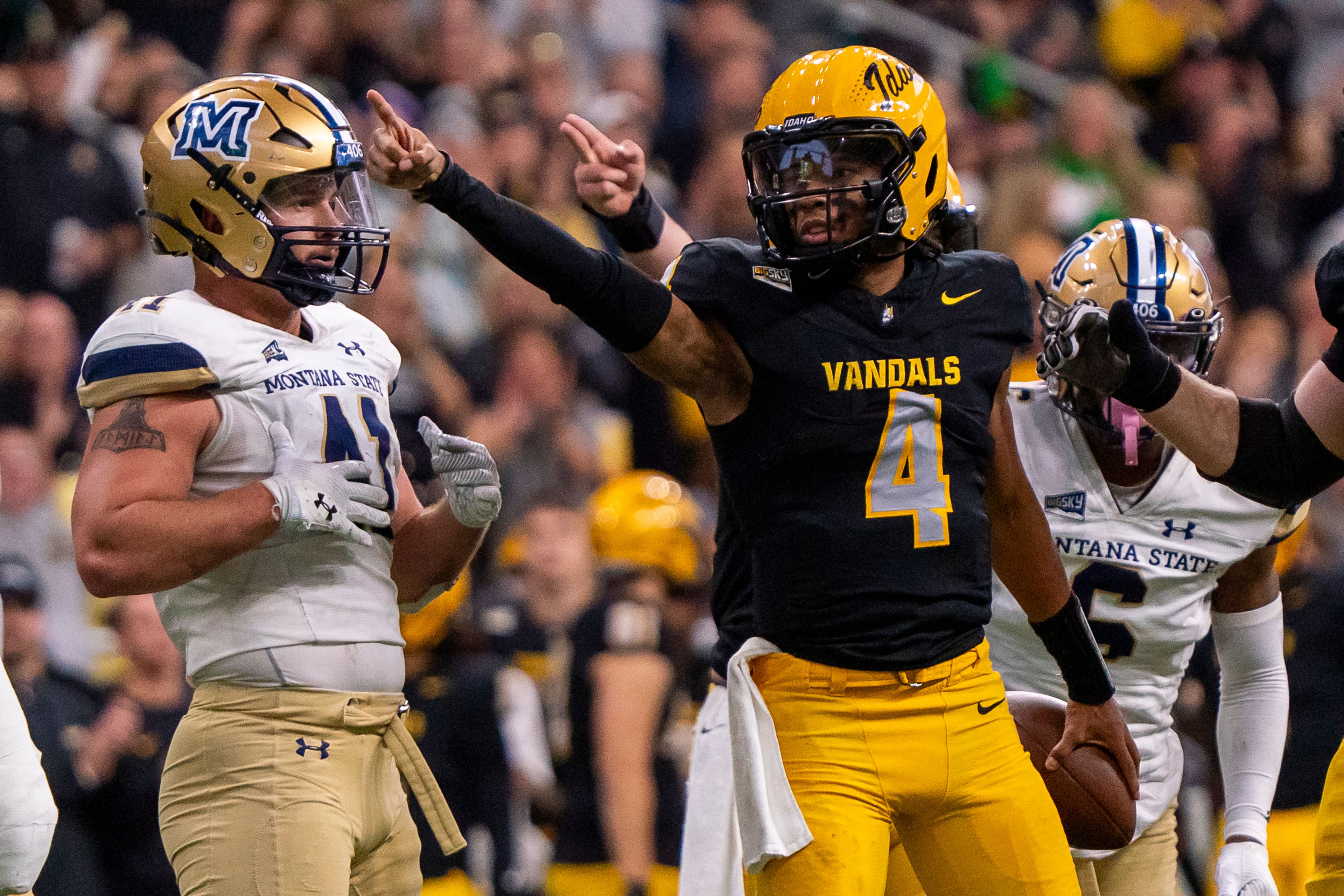 Idaho quarterback Gevani McCoy (4) signals a first down after running the ball during a game against Montana State on Oct. 28 at the P1FCU Kibbie Dome in Moscow.