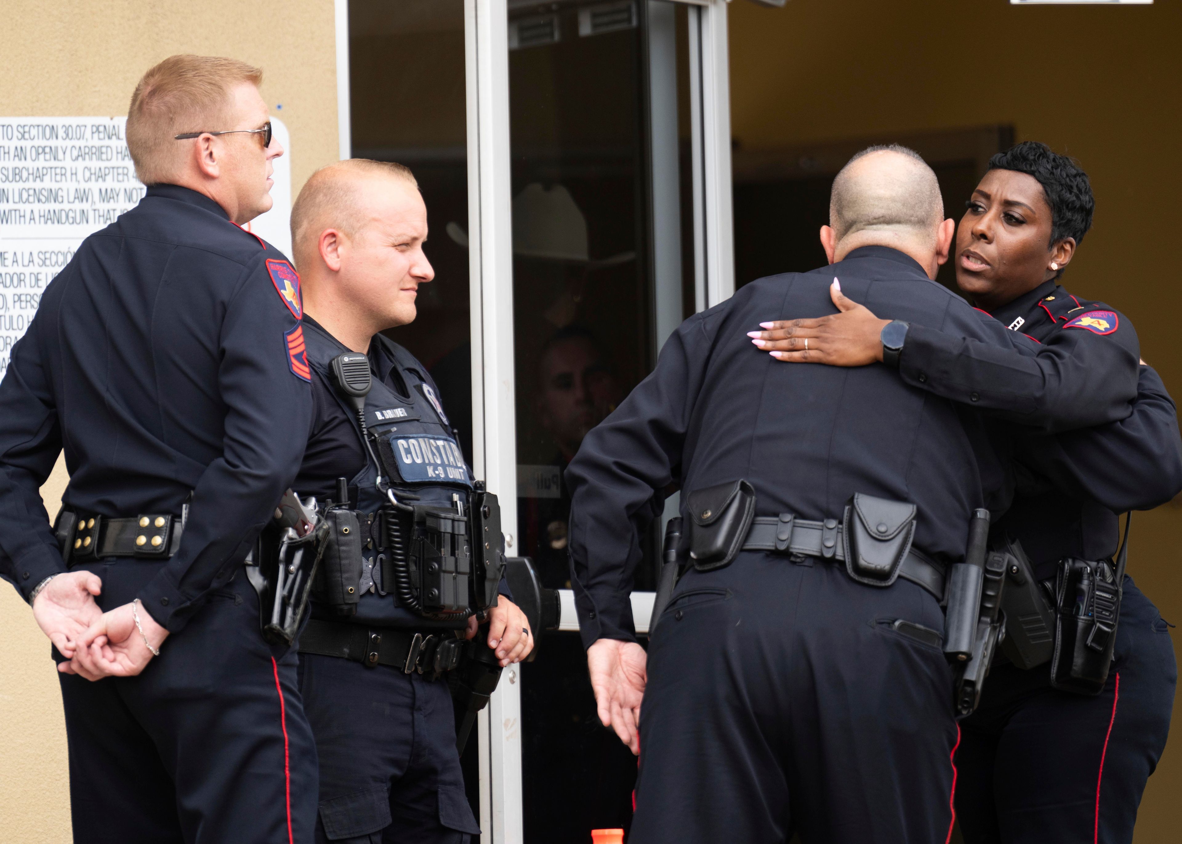 Harris County Precinct 4 Deputy Constables greet each other as they gather for funeral prayers in honor of Deputy Maher Husseini at Masjid Al Salem Mosque, Thursday, Sept. 5, 2024, in Spring, Texas.