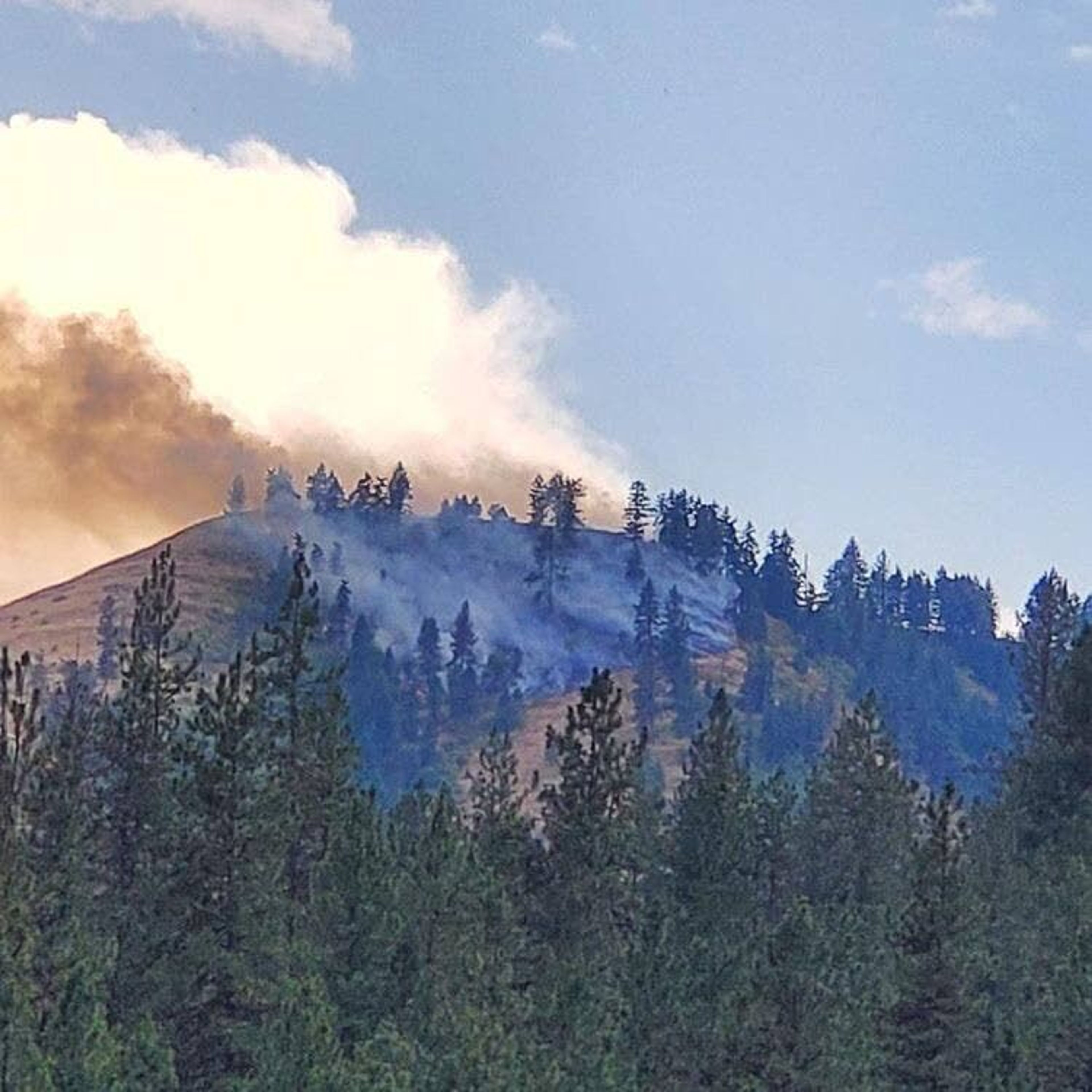 A fire burns between Kamiah and Kooskia, above Ridgewood Drive.