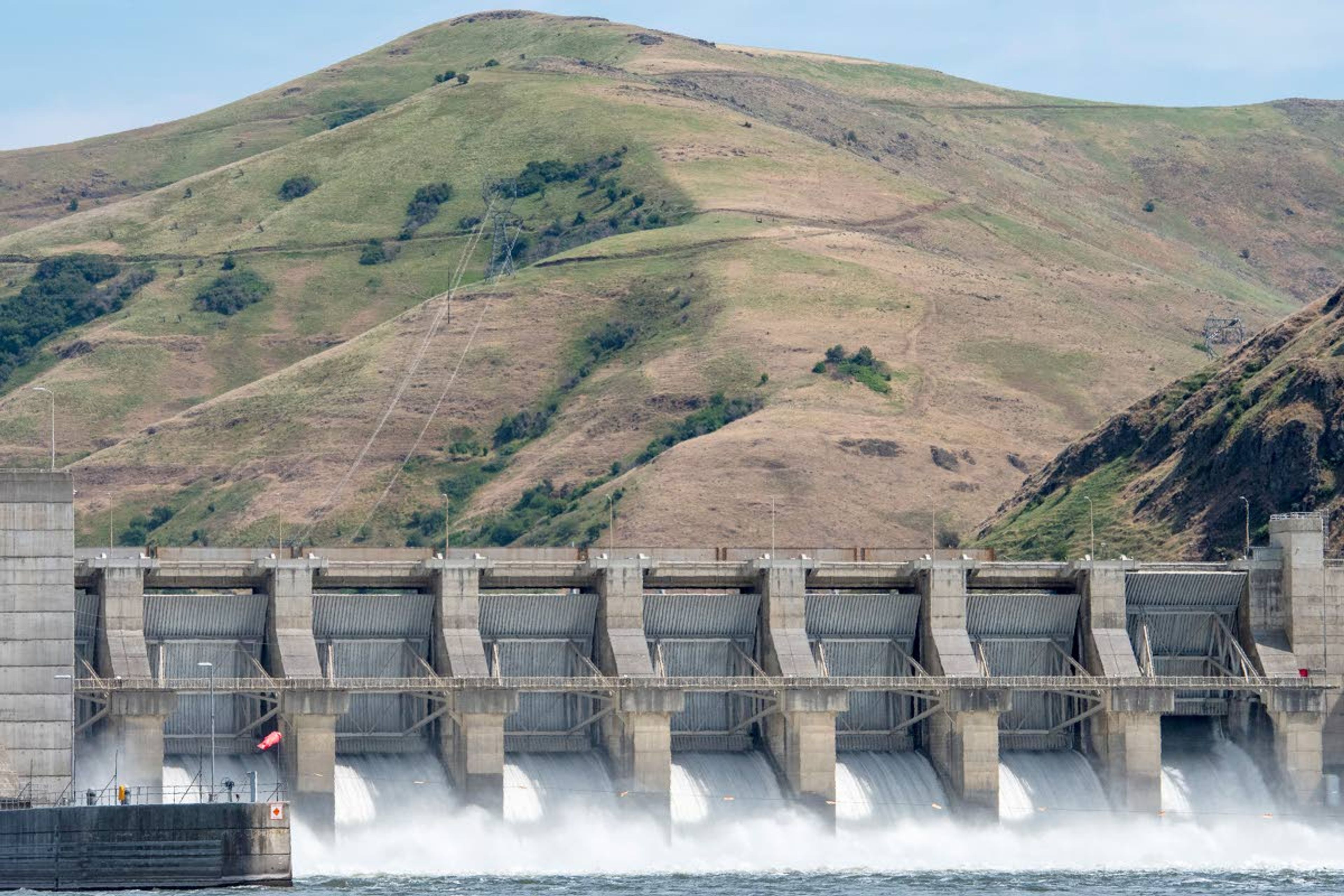 Water falls through the spillways of Lower Granite Dam on June 6, 2018, along the lower Snake River.