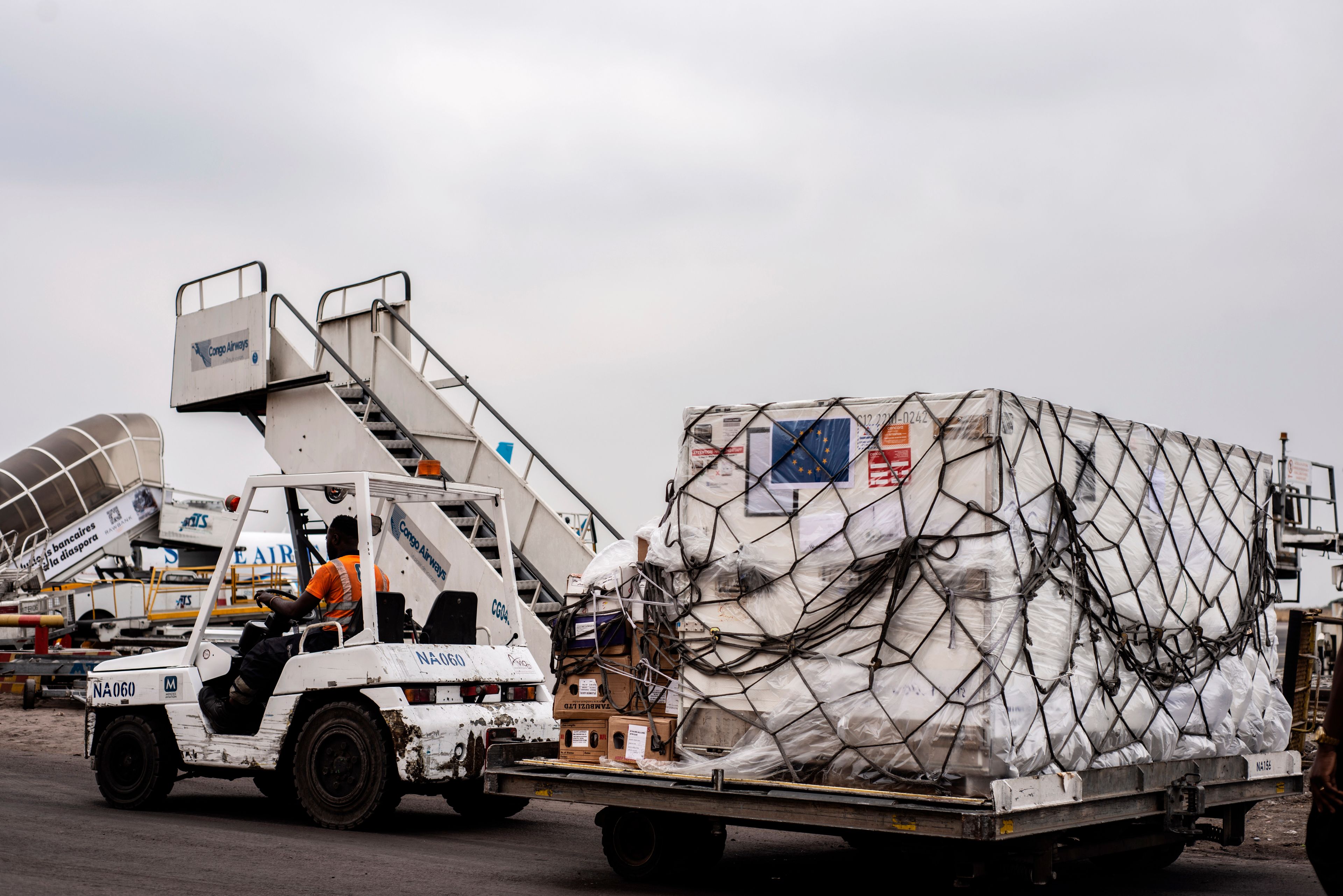 FILE- Mpox vaccine MVA-BN vaccine, manufactured by the Danish company Bavarian Nordic, are offloaded from a plane in Kinshasa, Congo, Sept. 5, 2024.