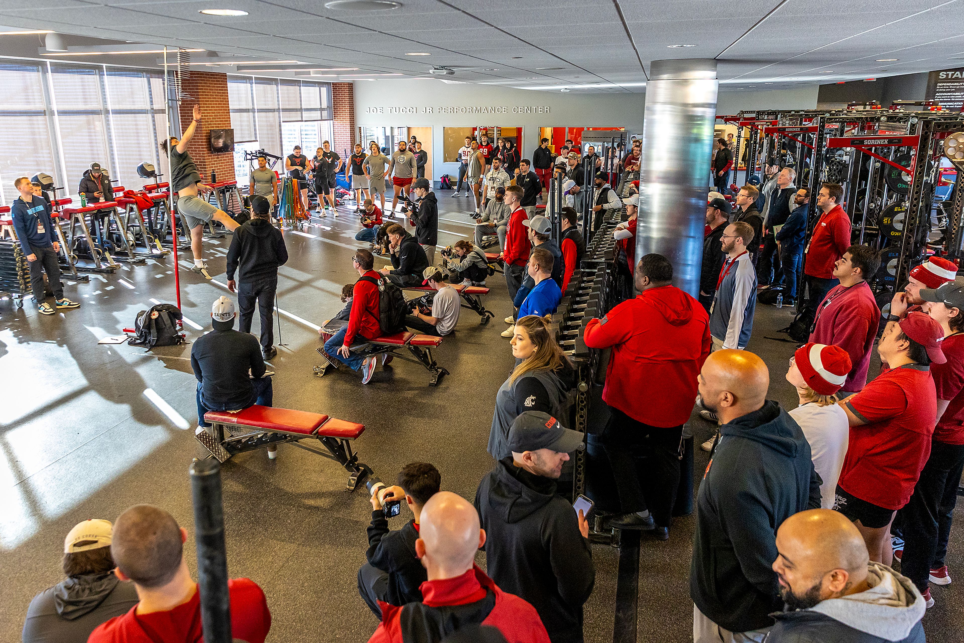 Washington State tight end Cooper Mathers does the vertical jump test as NFL scouts and others watch during WSU's Pro Day on Friday in Pullman.