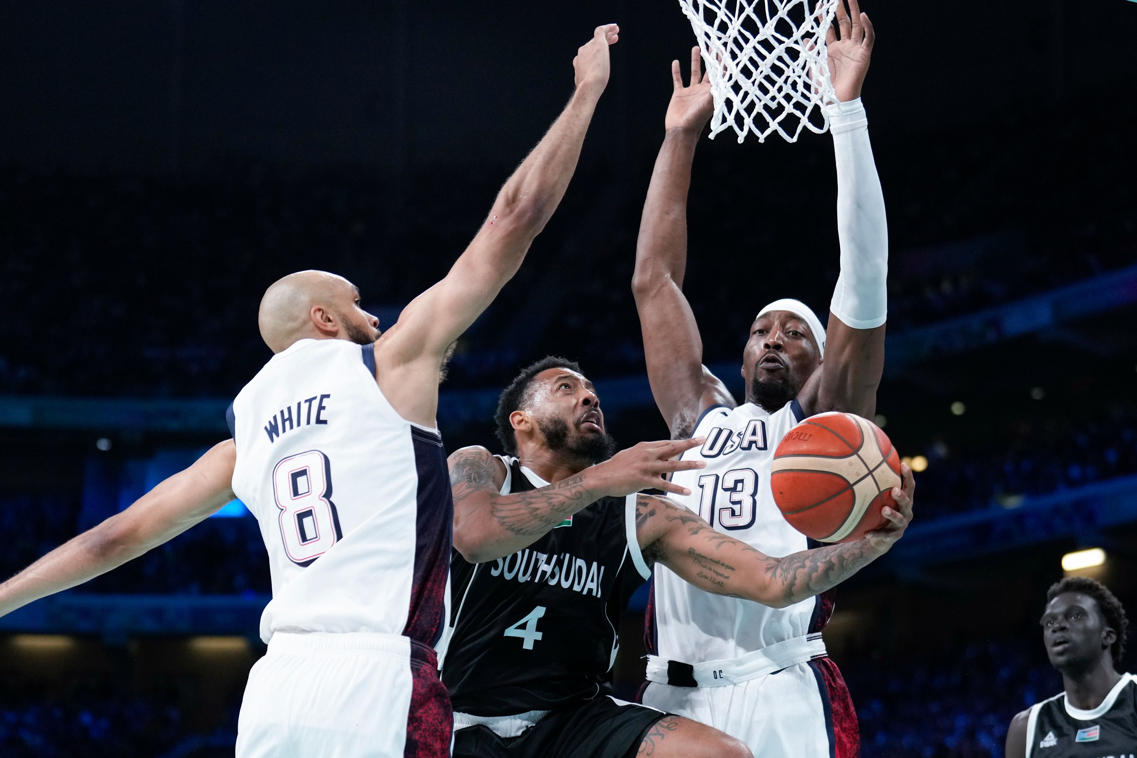 in a men's basketball game at the 2024 Summer Olympics, Wednesday, July 31, 2024, in Villeneuve-d'Ascq, France. (AP Photo/Mark J. Terrill)