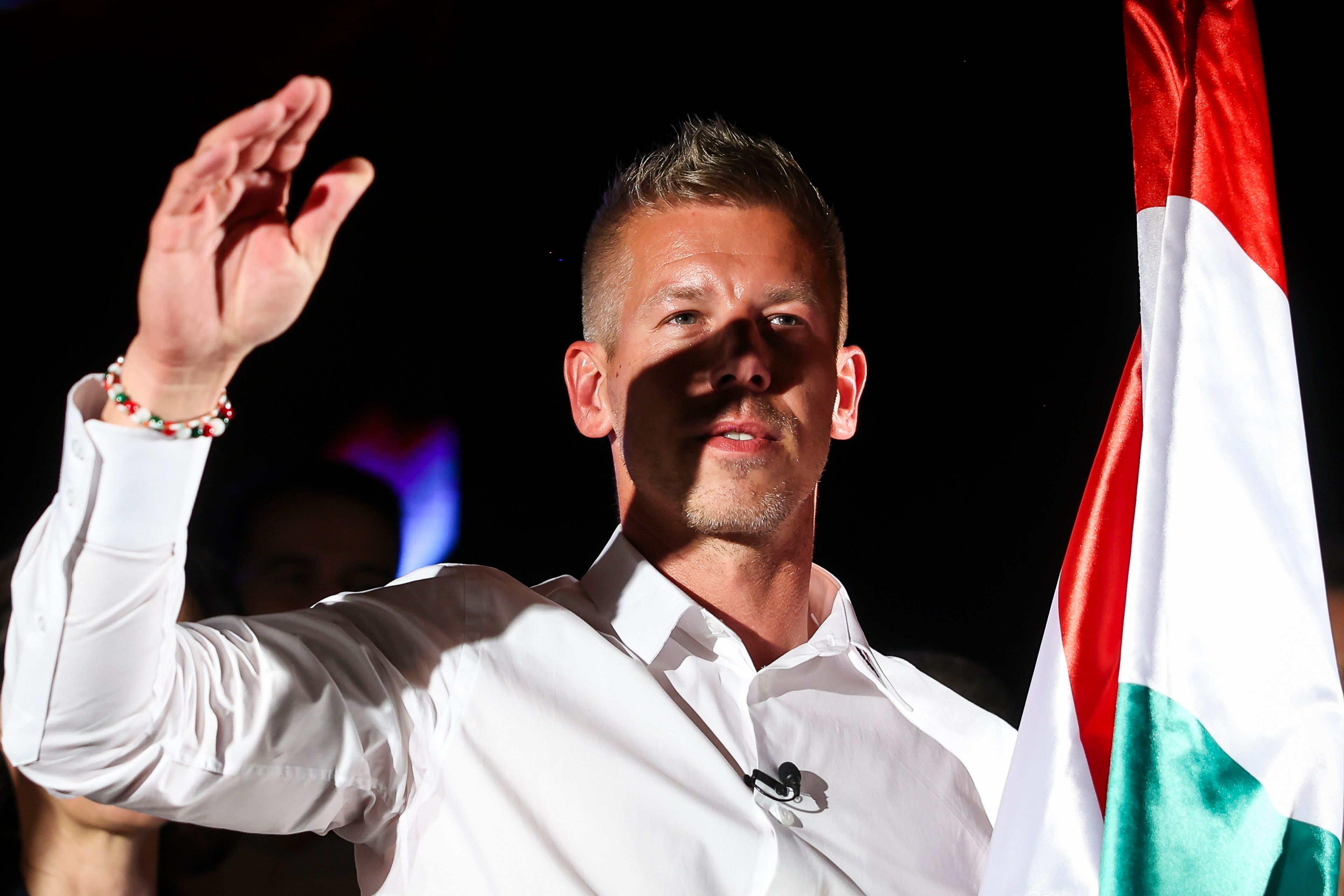 Top candidate for the European elections of the Respect and Freedom (TISZA) Party Peter Magyar waves to his supporters during the party's election night party after the European Parliament and local elections in Budapest, Hungary, early Monday, June 10, 2024.