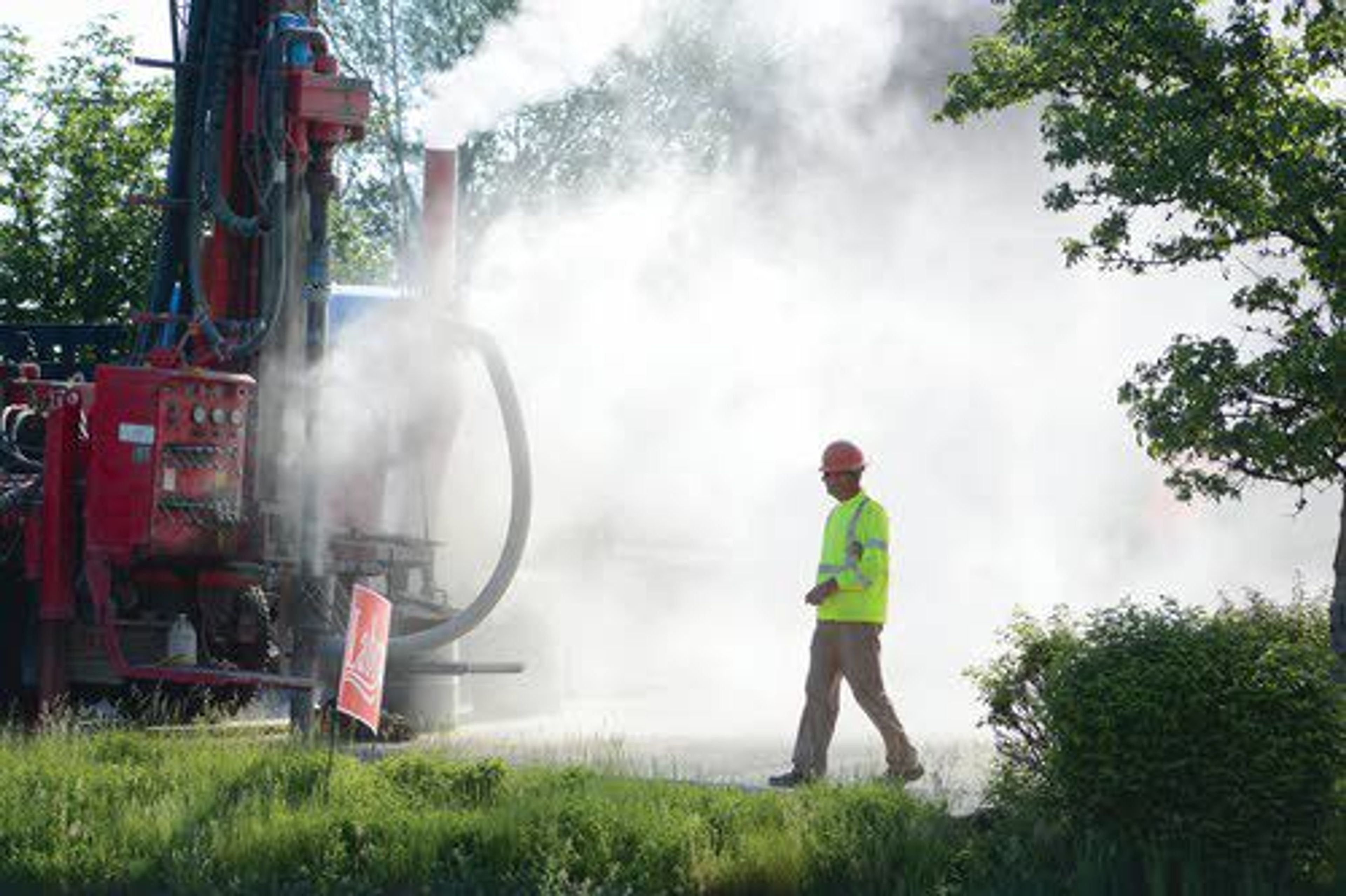 News photo Monitoring well goes in