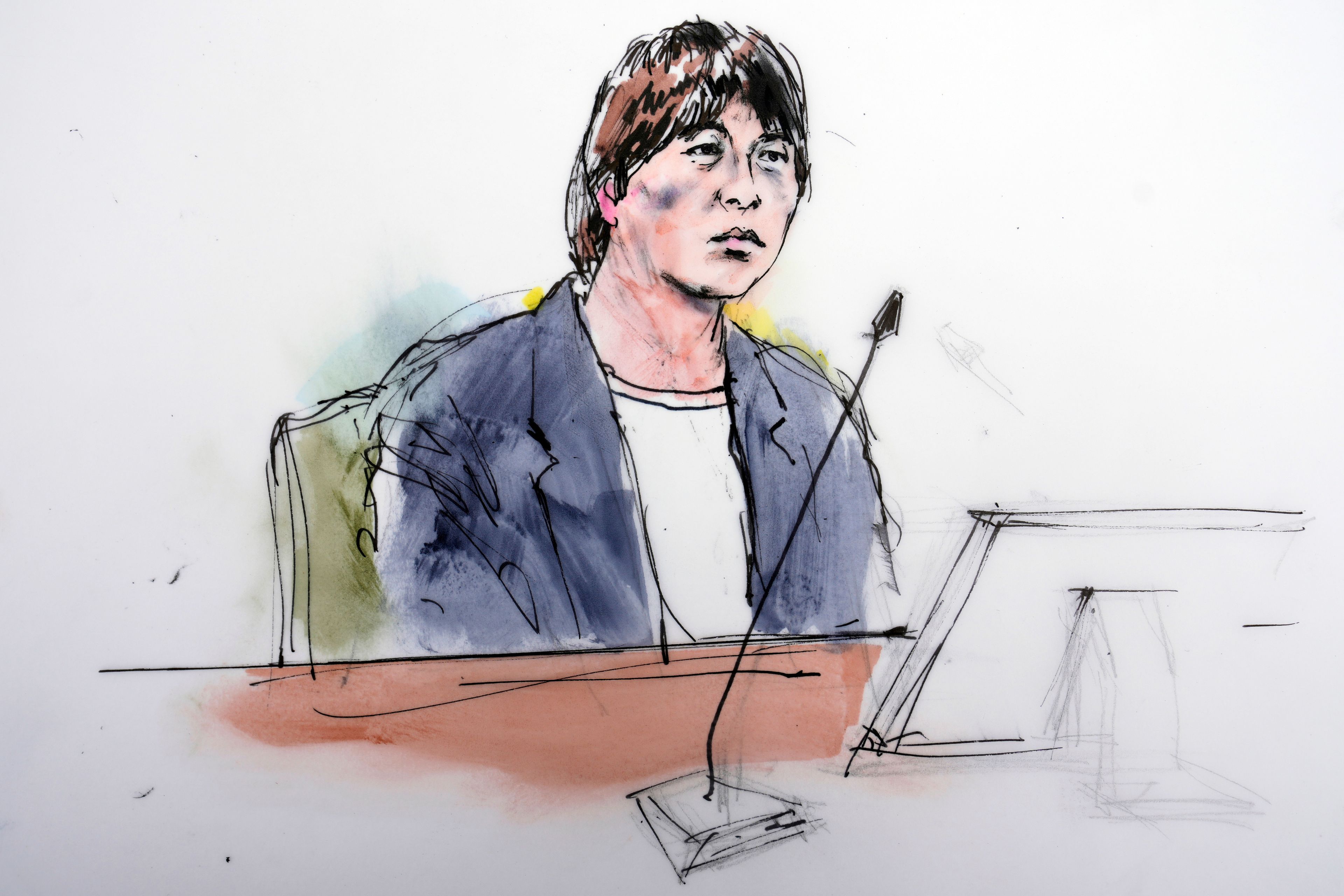 In this courtroom sketch, Ippei Mizuhara, the former interpreter for the Los Angeles Dodgers star Shohei Ohtani, appears in federal court in Los Angeles, Tuesday, June 4, 2024. Mizuhara pleaded guilty to bank and tax fraud on Tuesday and admitted to stealing nearly $17 million from the Japanese baseball player to pay off sports betting debts.